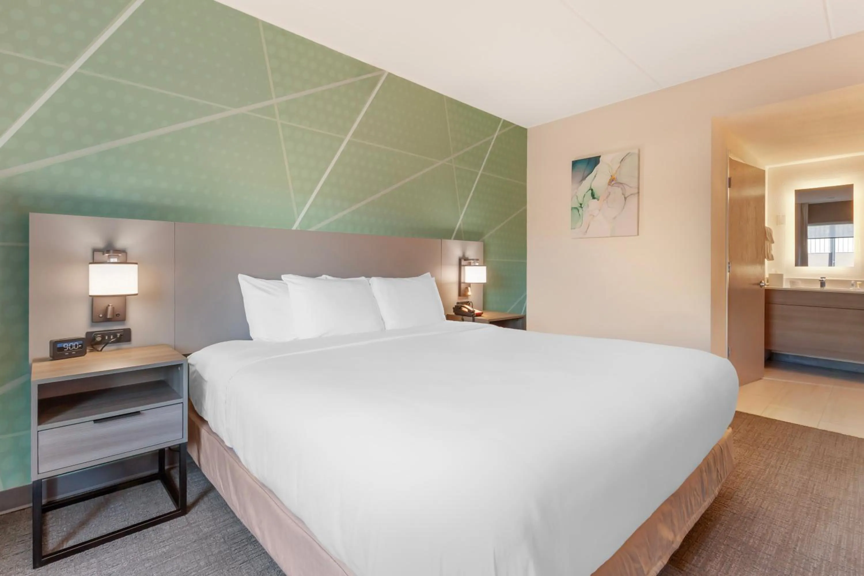 Bed in Comfort Inn & Suites Beaver Dam