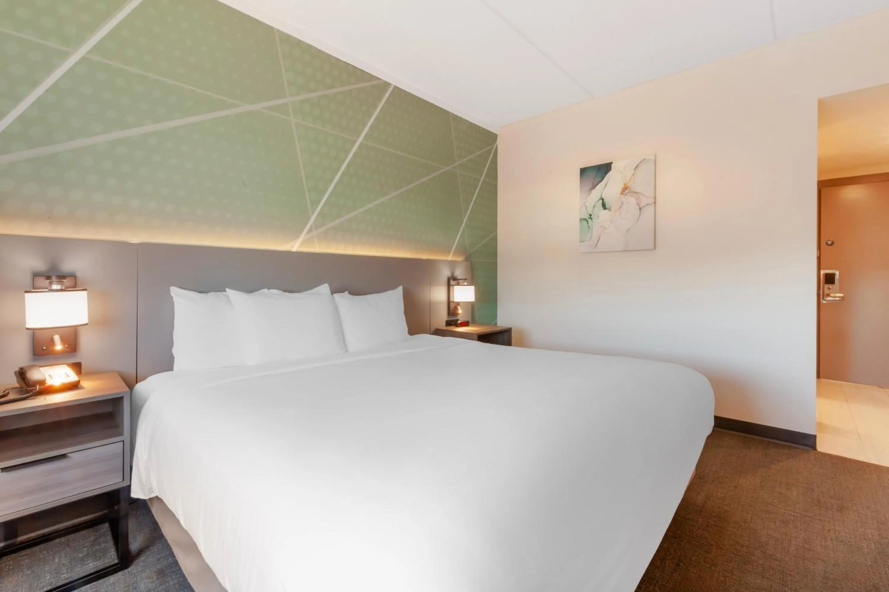 Bed in Comfort Inn & Suites Beaver Dam