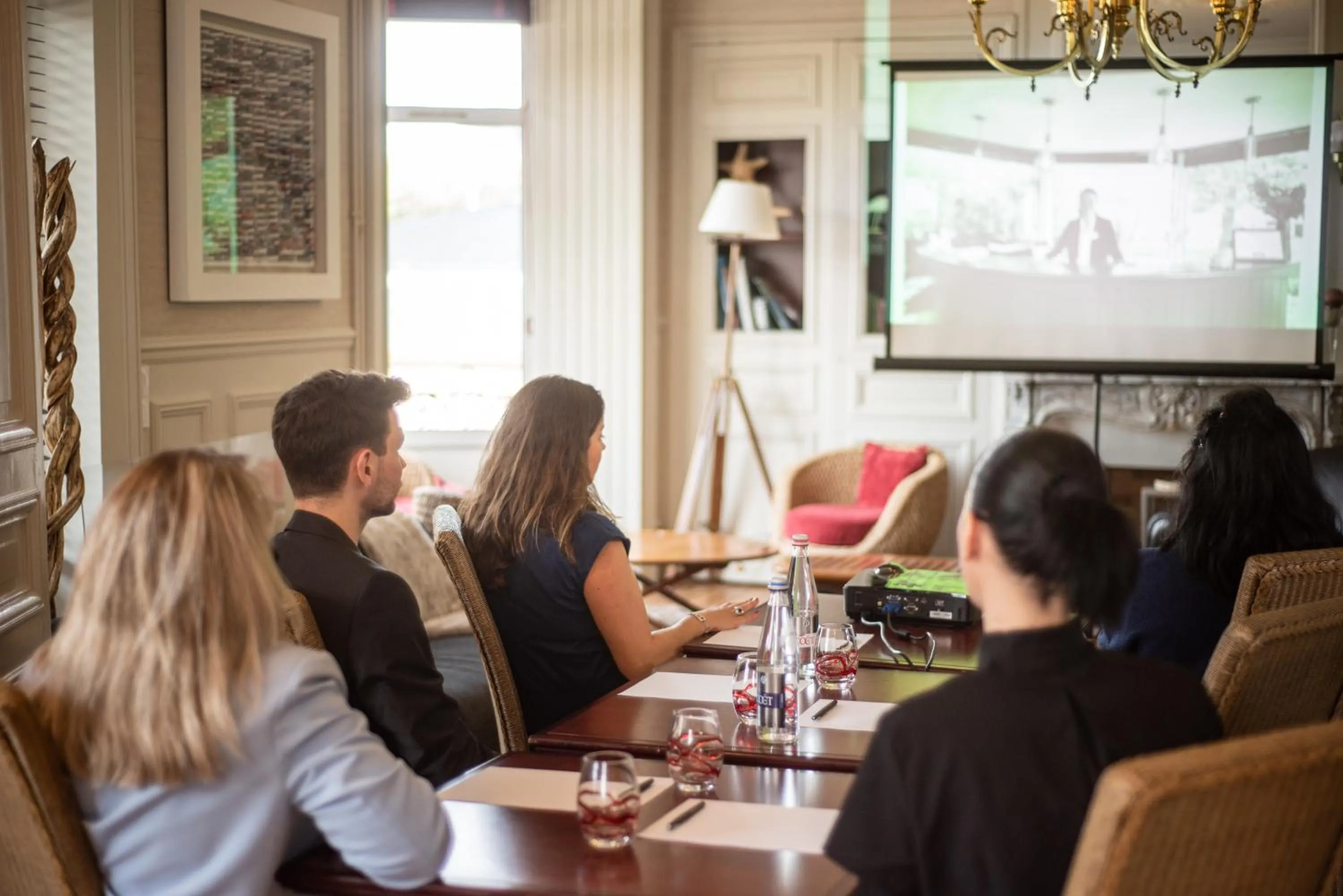 Communal lounge/ TV room in Hôtel La Villefromoy