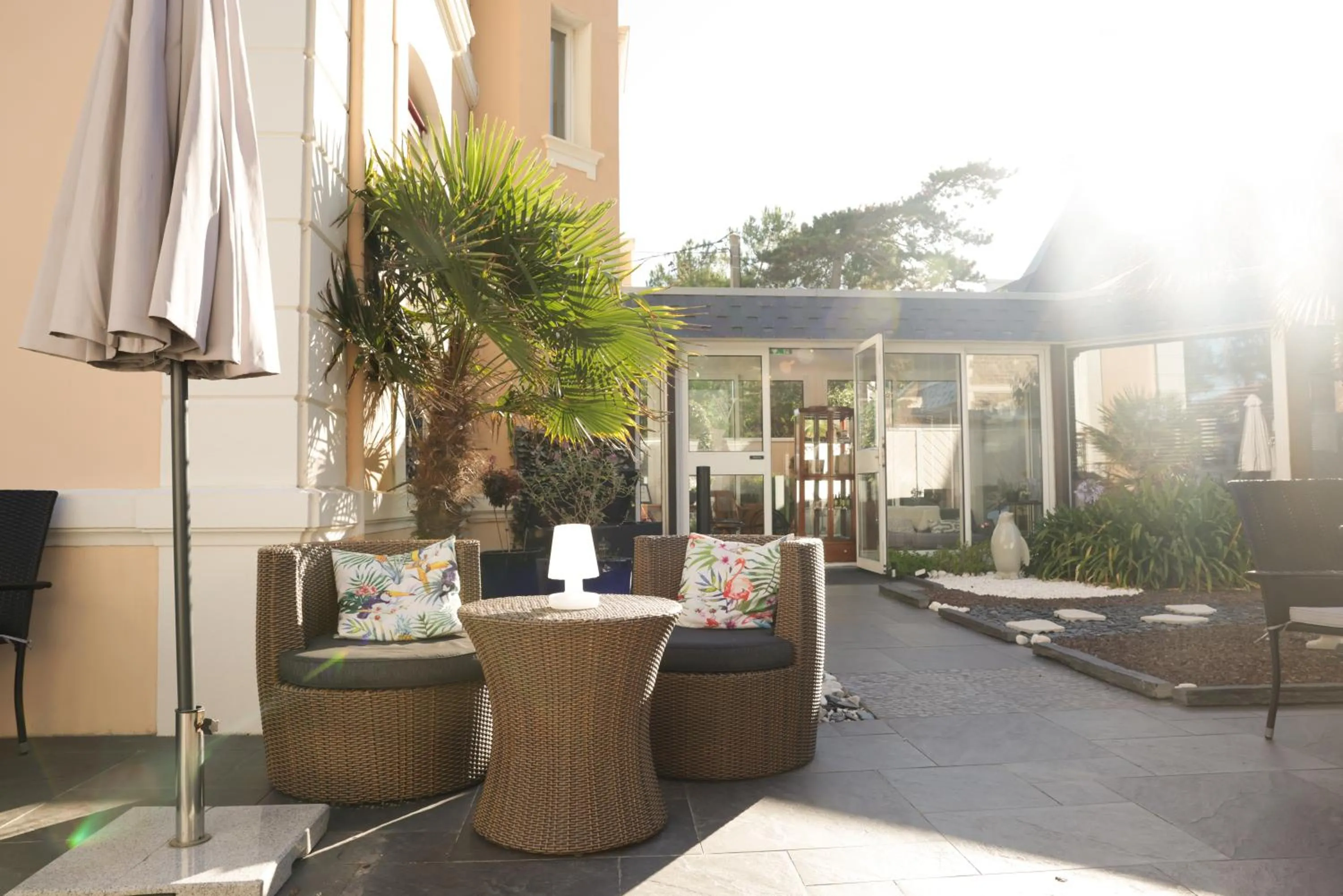 Patio in Hôtel La Villefromoy