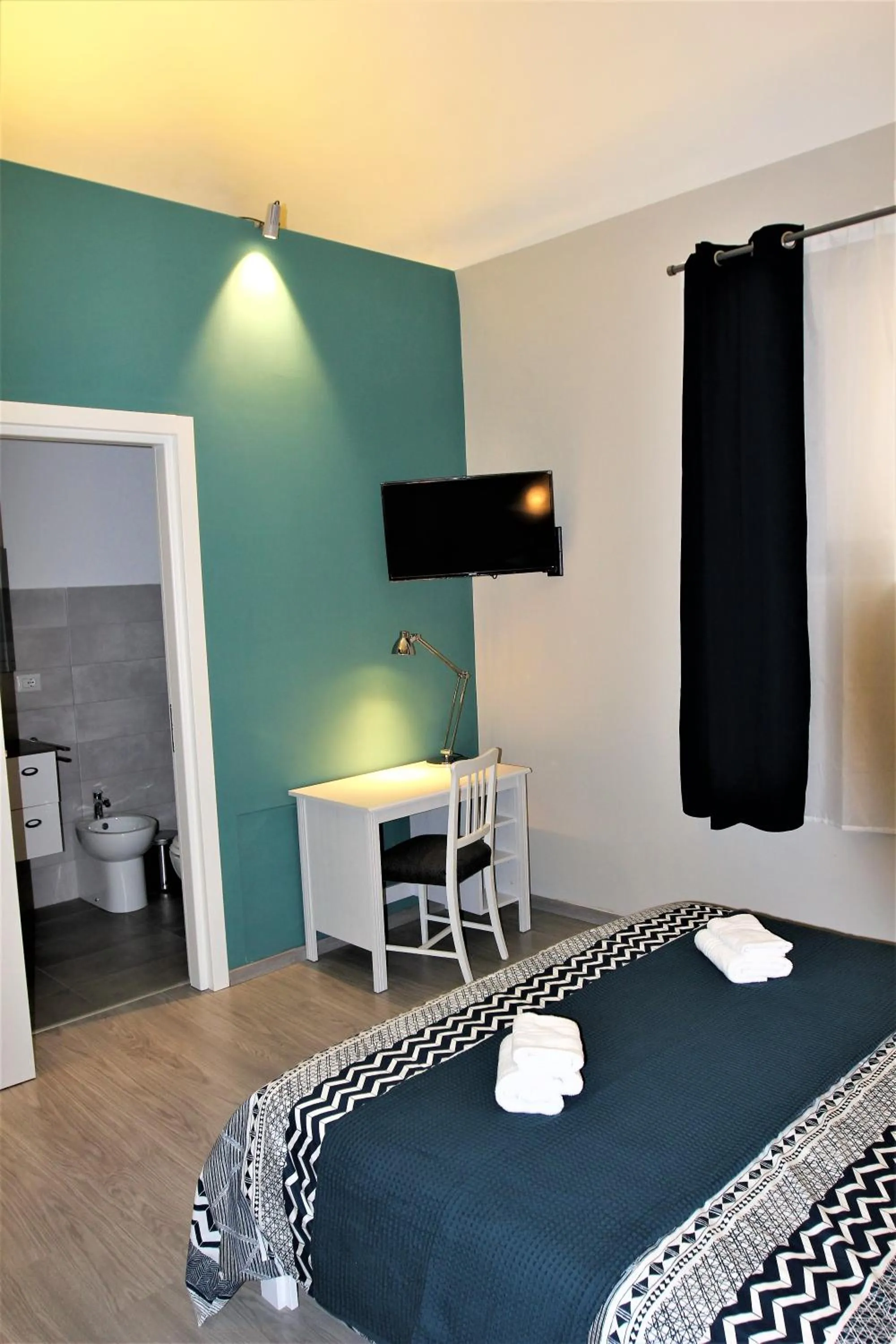 Photo of the whole room in B&B Terre di Catania