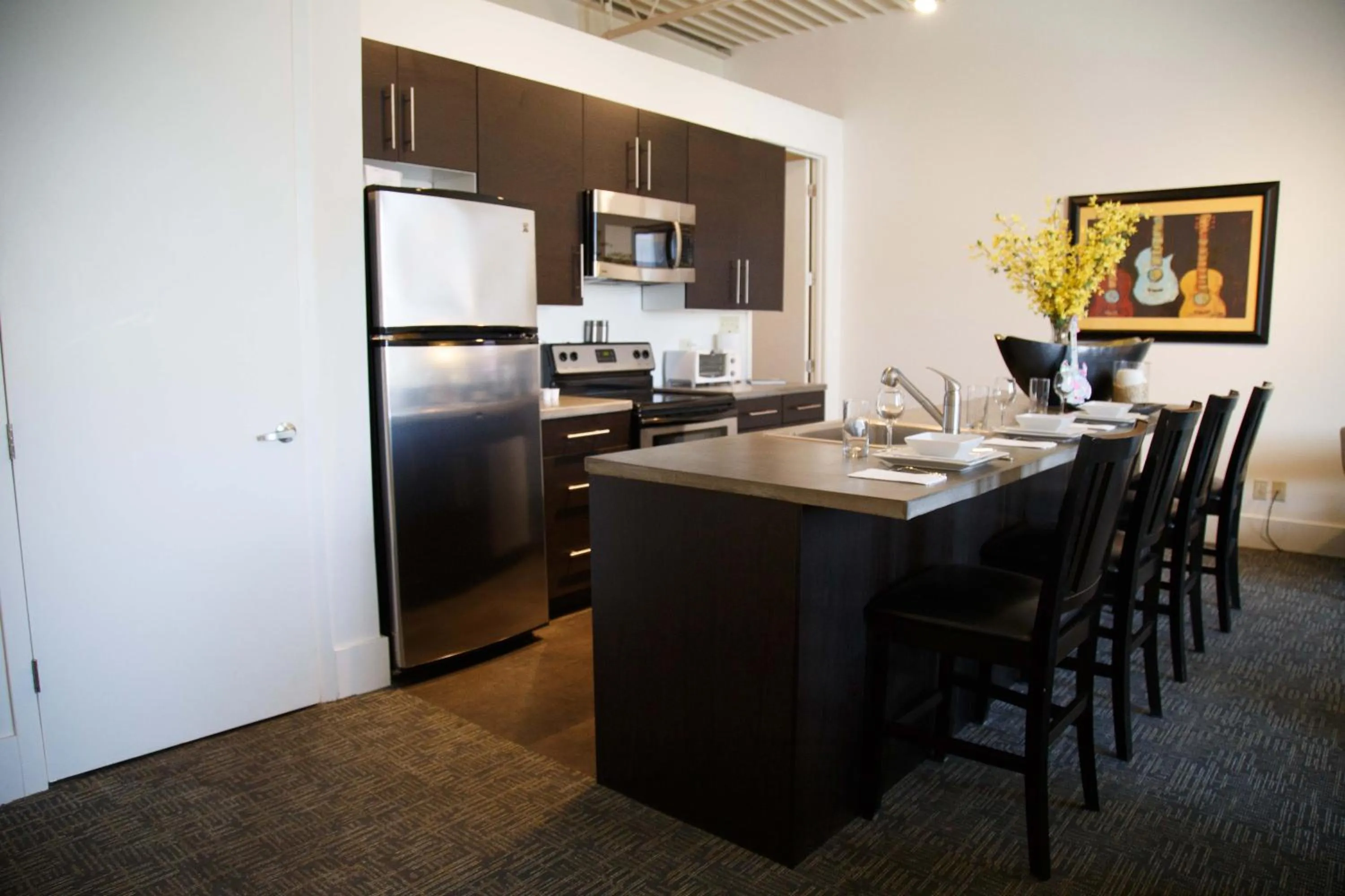 Kitchen or kitchenette in The Lofts at the Five & DIme