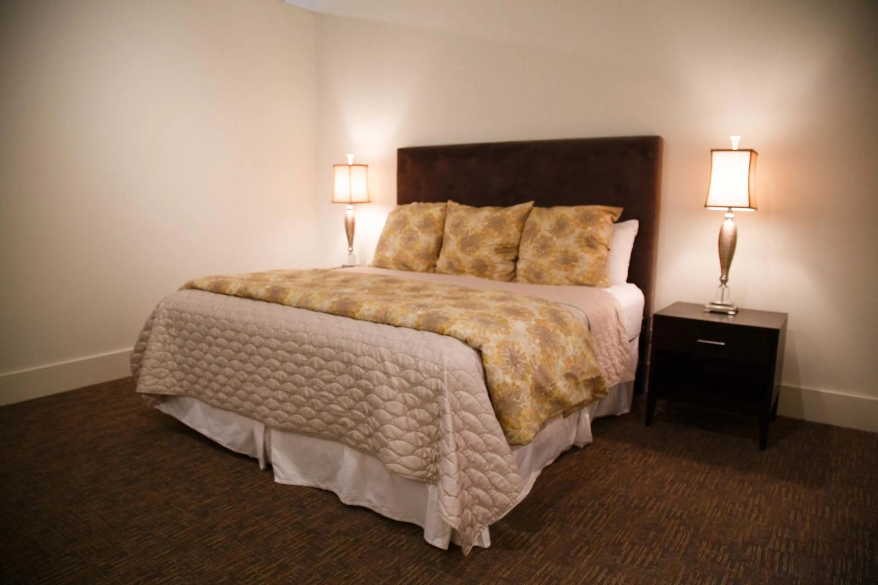 Bed in The Lofts at the Five & DIme