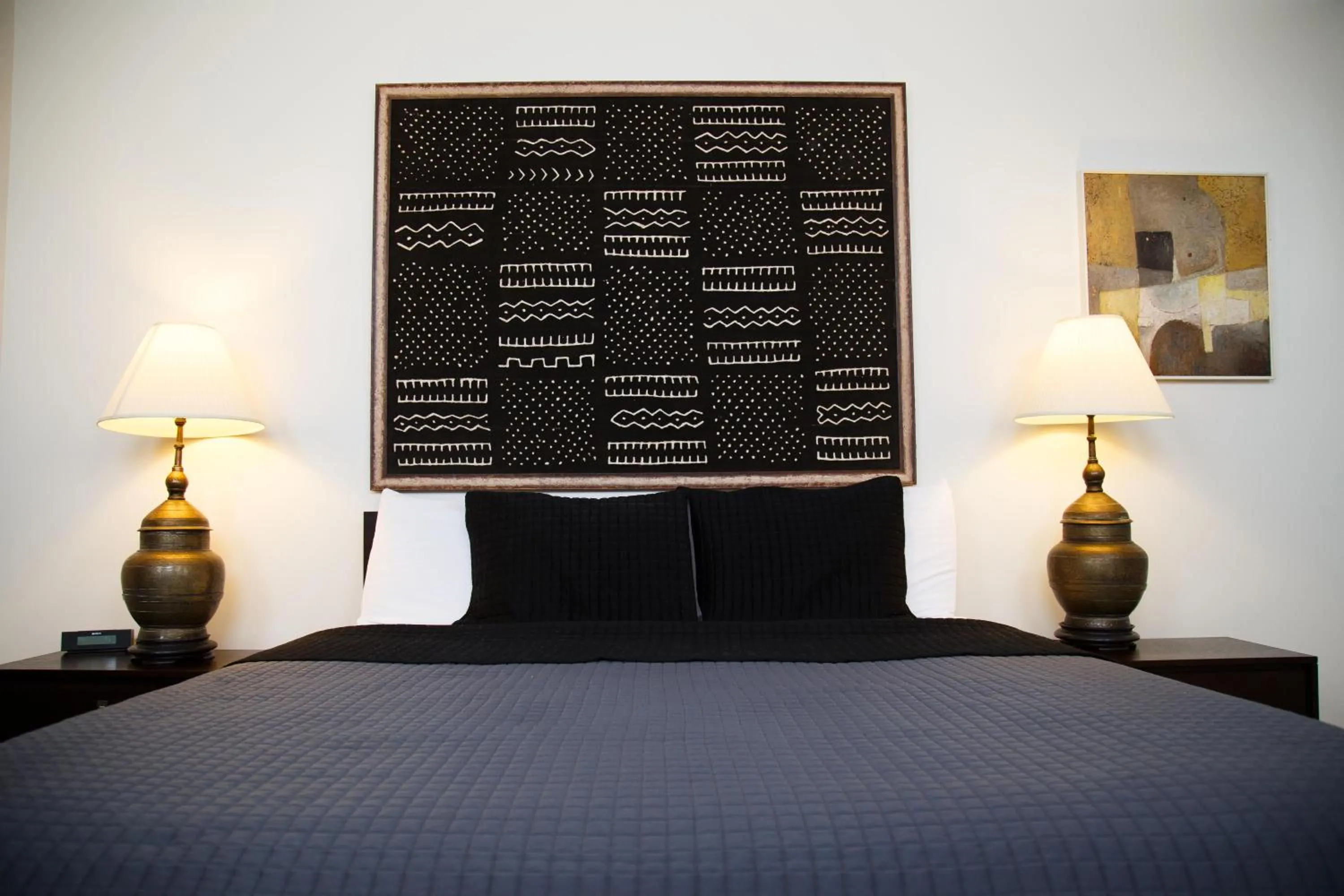 Bed in The Lofts at the Five & DIme