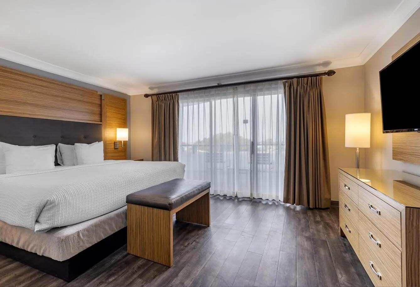 Bed in The Encinitan Hotel & Suites