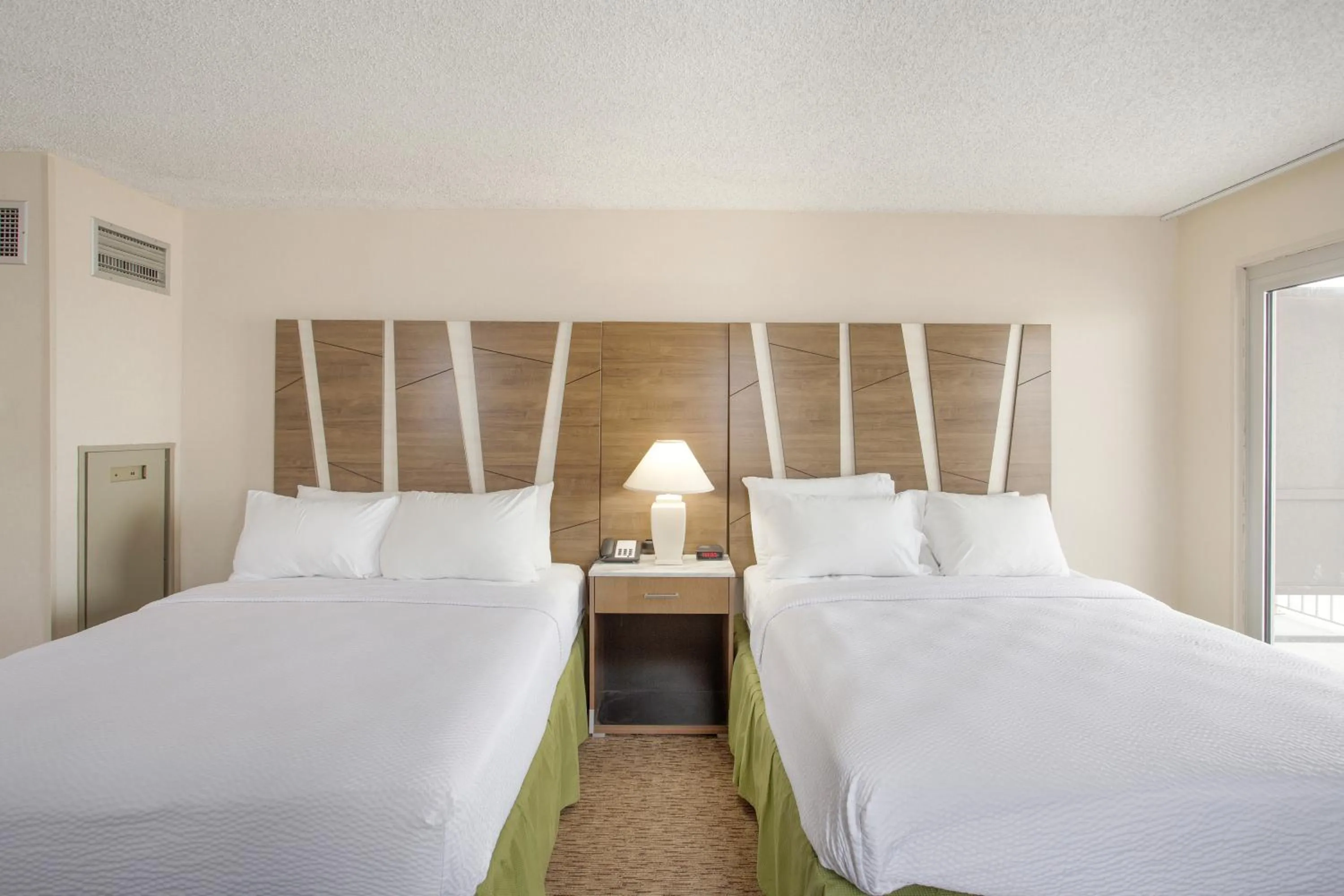 Bed in Americana Hotel Boardwalk