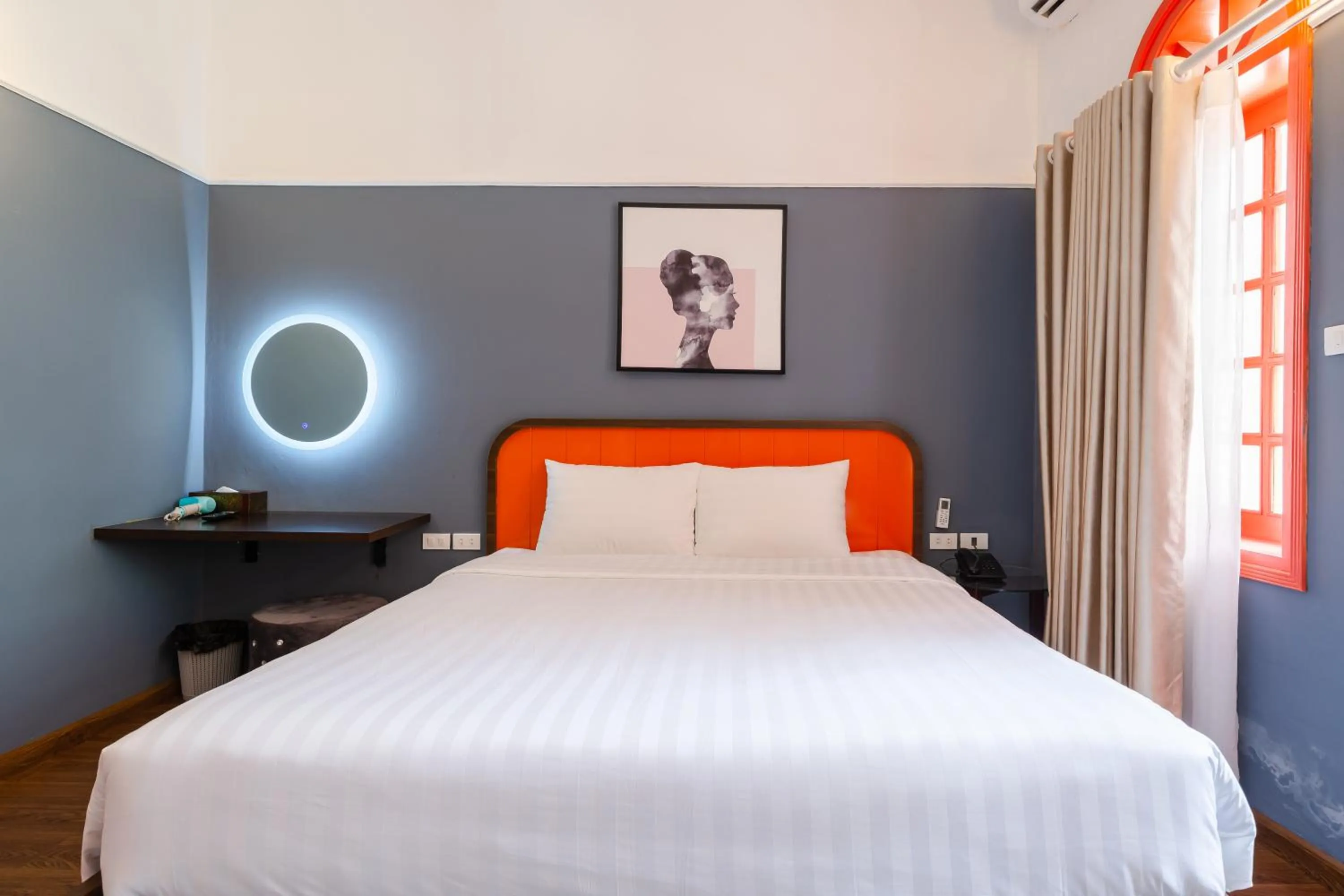 Bed in The Poppy Villa & Hotel