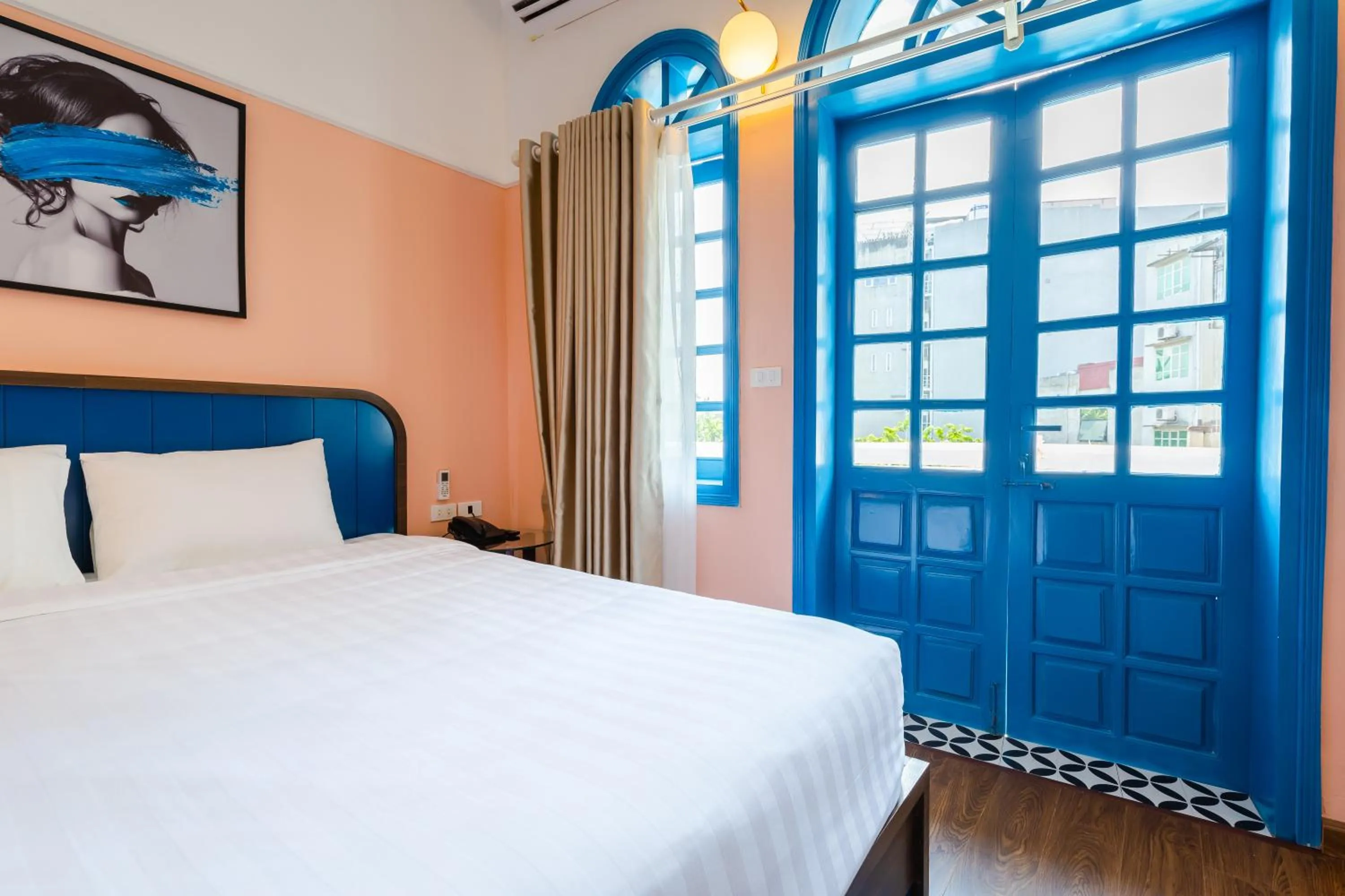 Bed in The Poppy Villa & Hotel