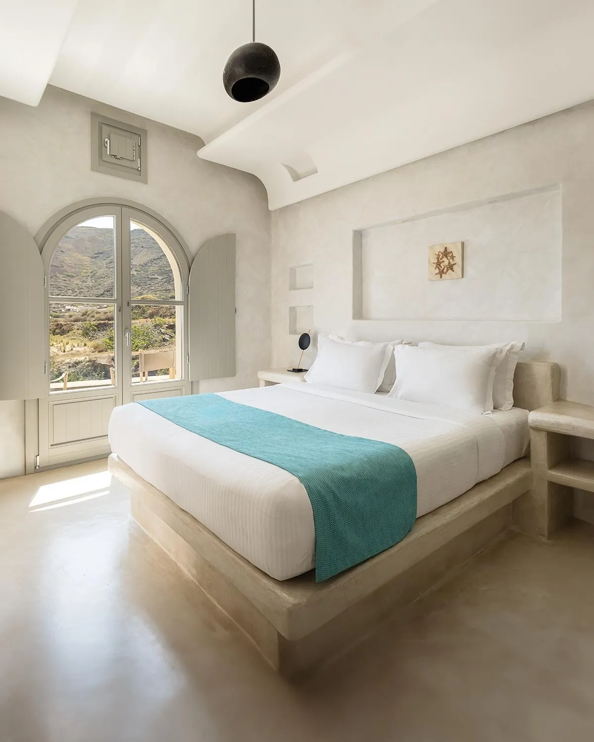 Bed in Danae Suites Santorini