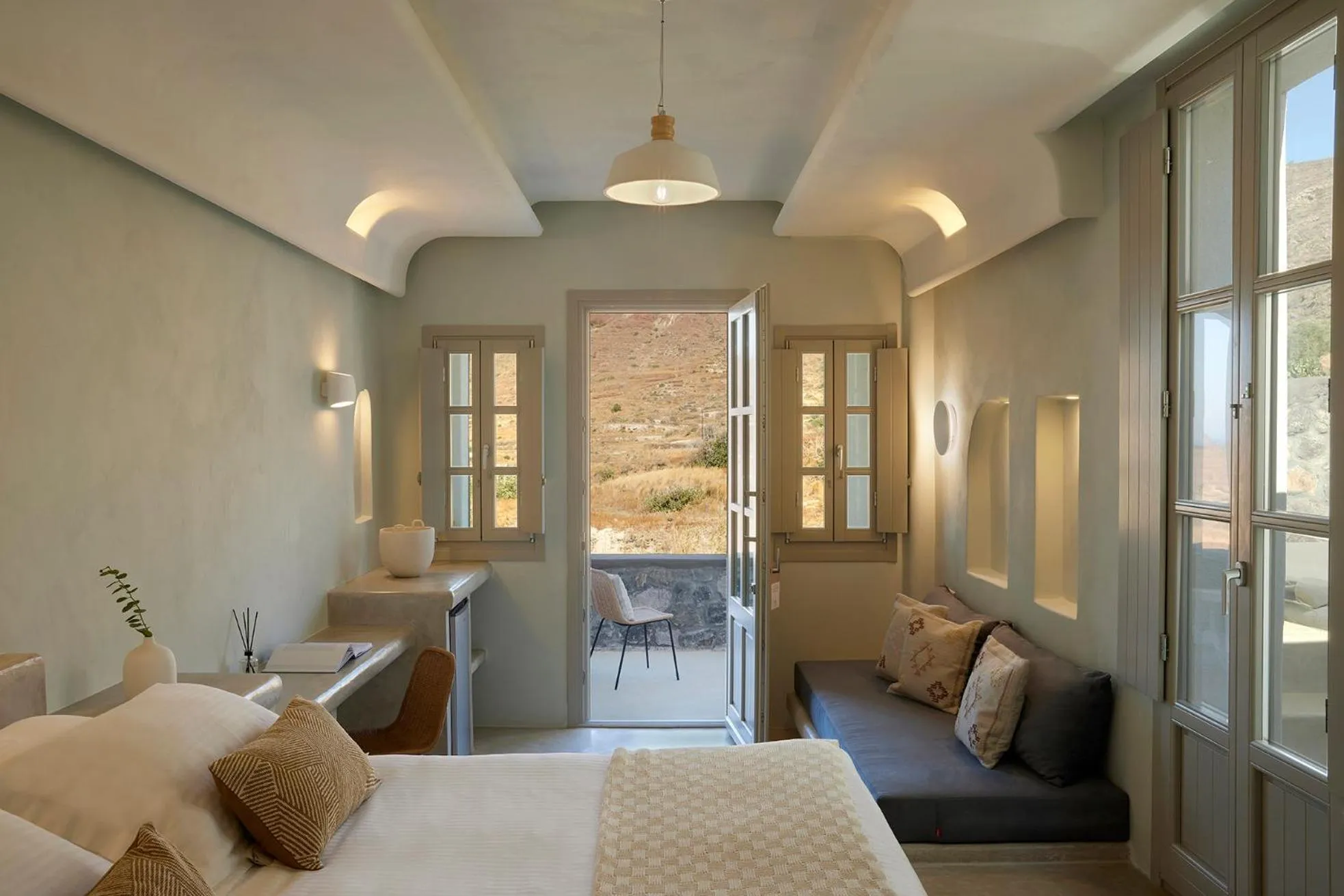 Bed in Danae Suites Santorini