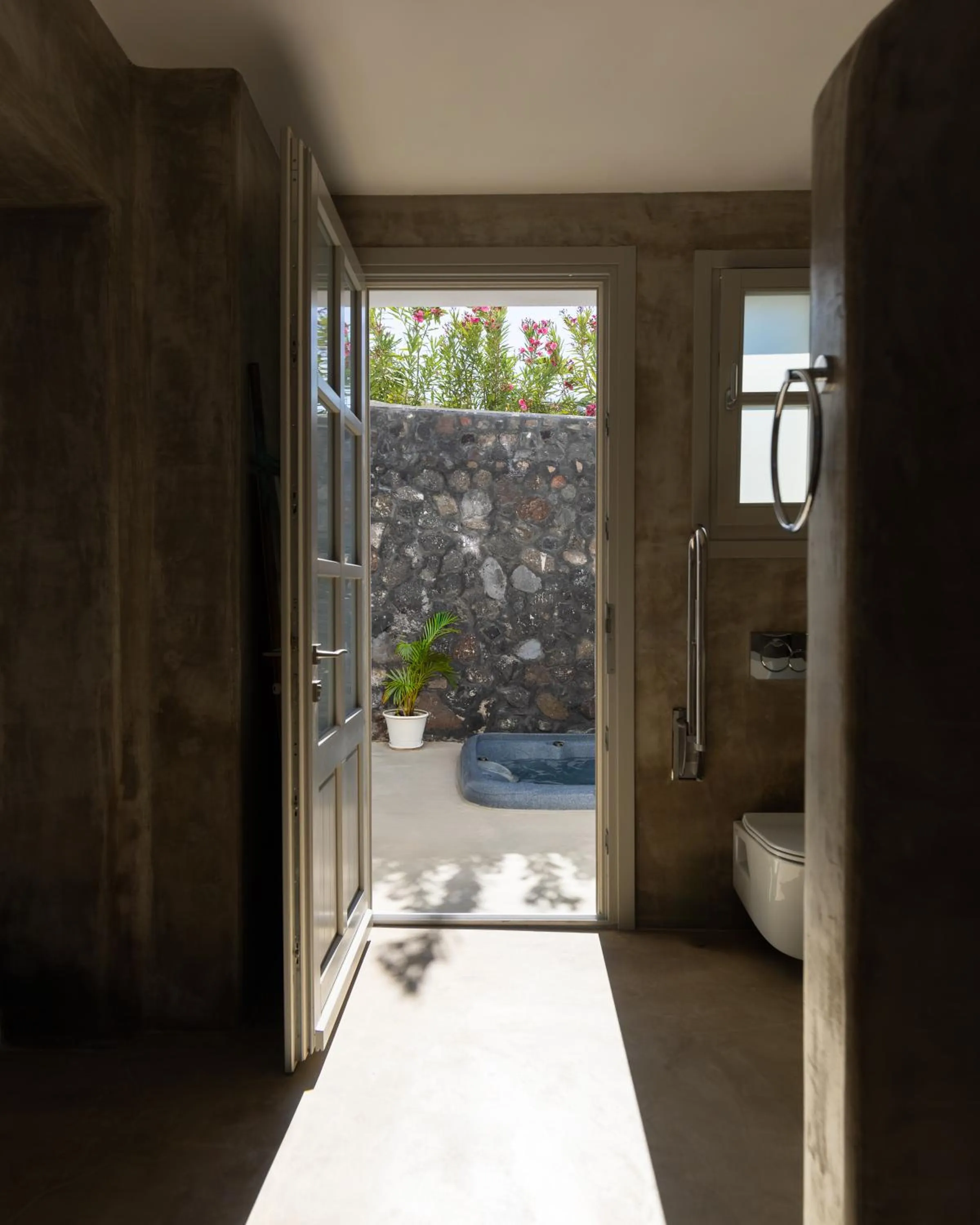 Photo of the whole room in Danae Suites Santorini