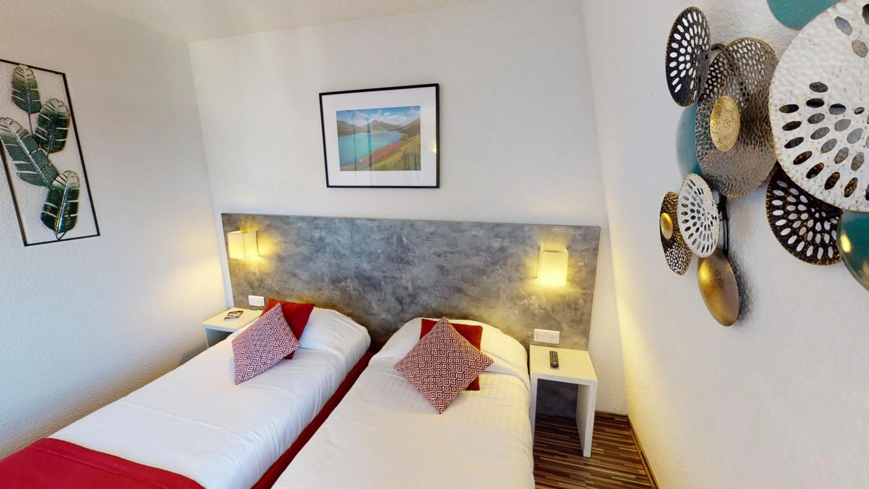 Bed in Hôtel de France Contact-Hôtel