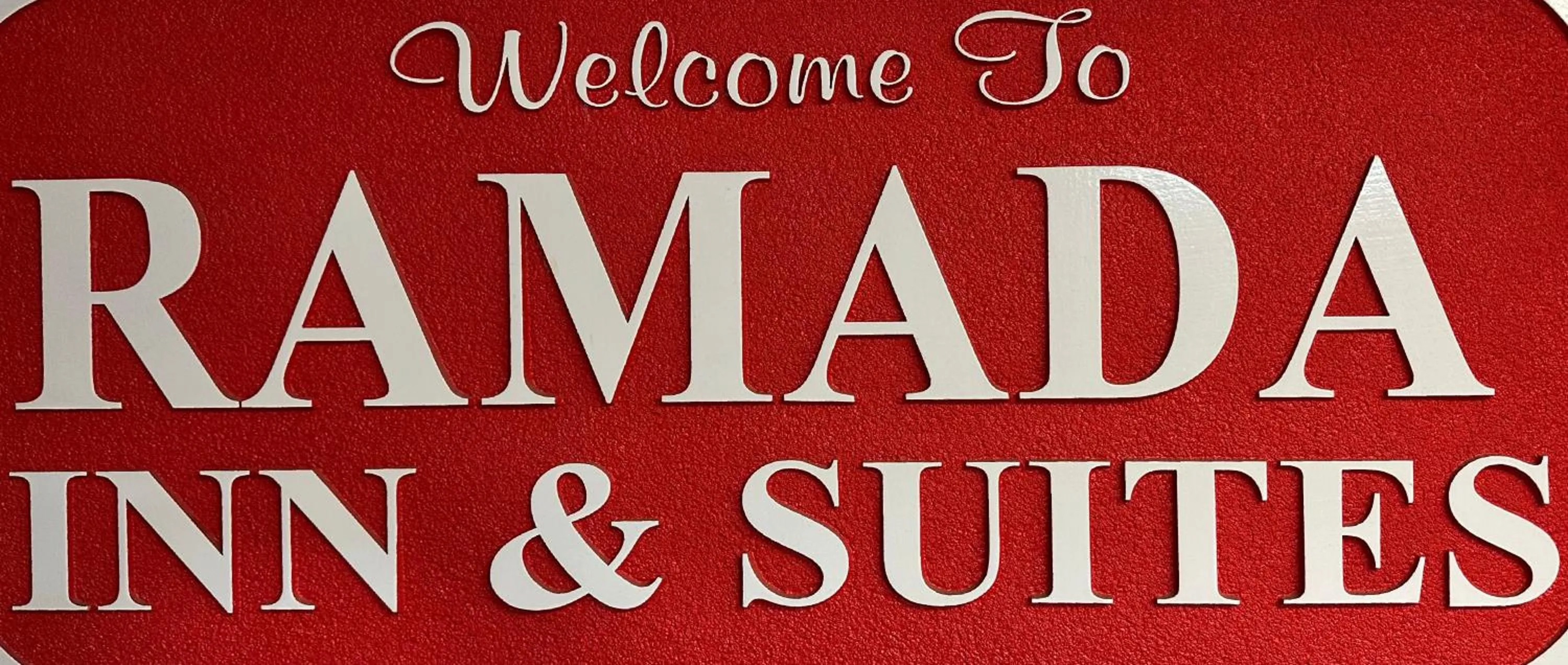 Property logo or sign in Ramada by Wyndham Saginaw Hotel & Suites