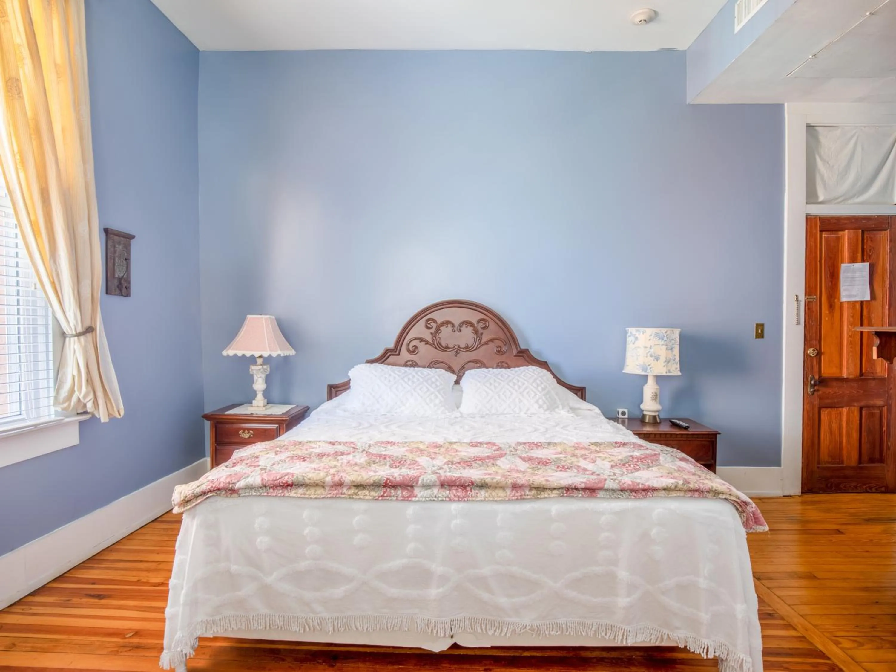 Bedroom, Bed in The Belmont Inn by OYO