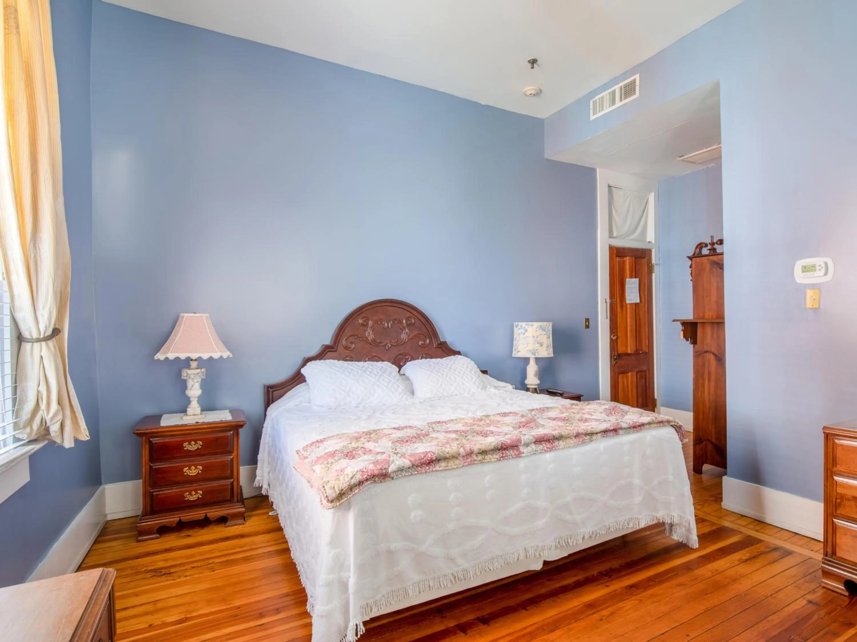 Bedroom, Bed in The Belmont Inn by OYO