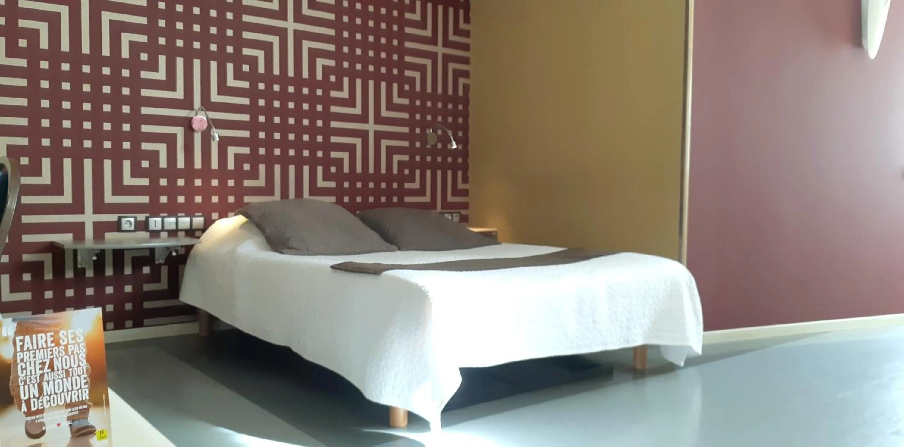 Photo of the whole room, Bed in Logis Hôtel & Restaurant Arcombelle