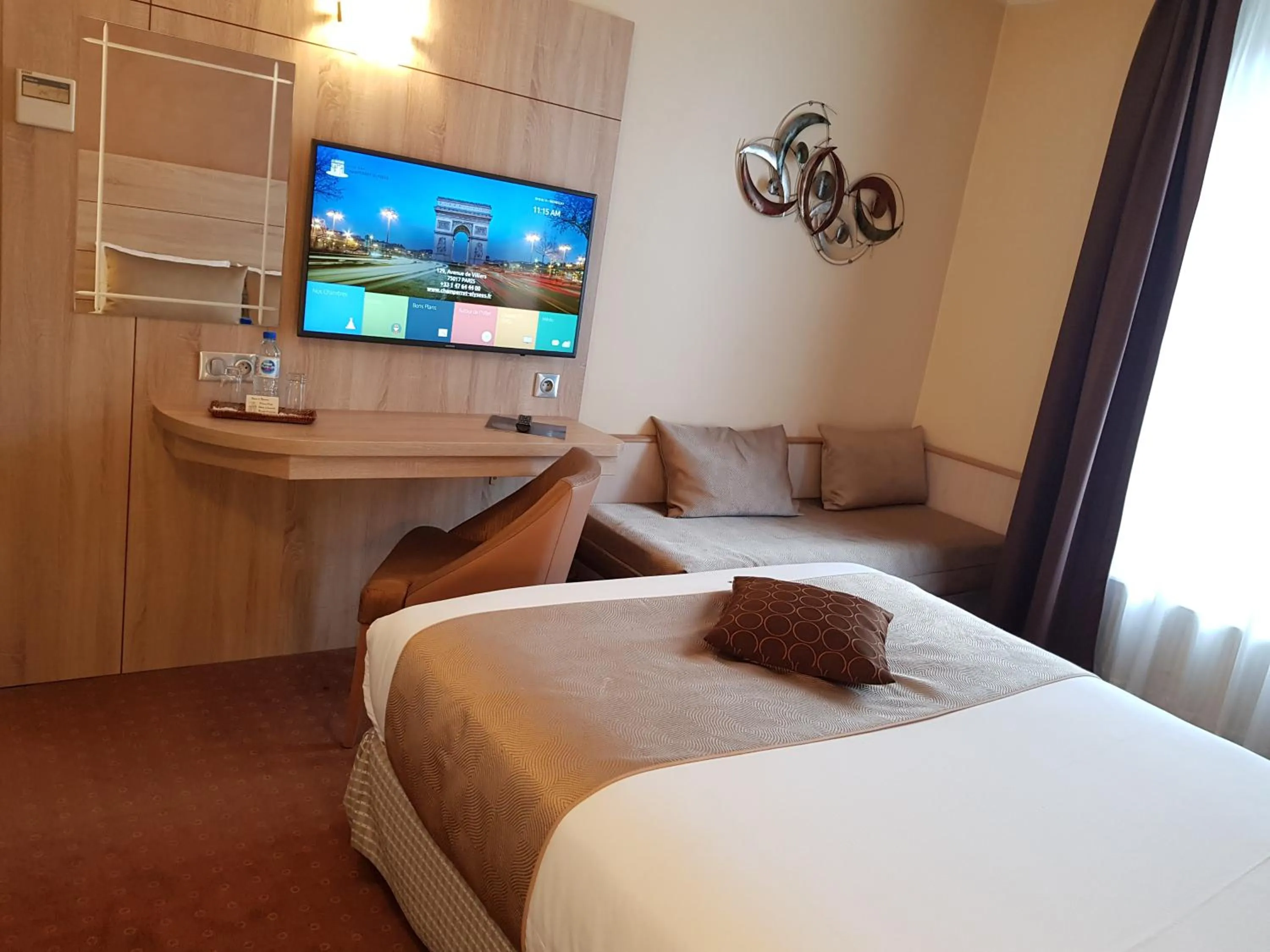 Bed in Hotel Champerret Elysees