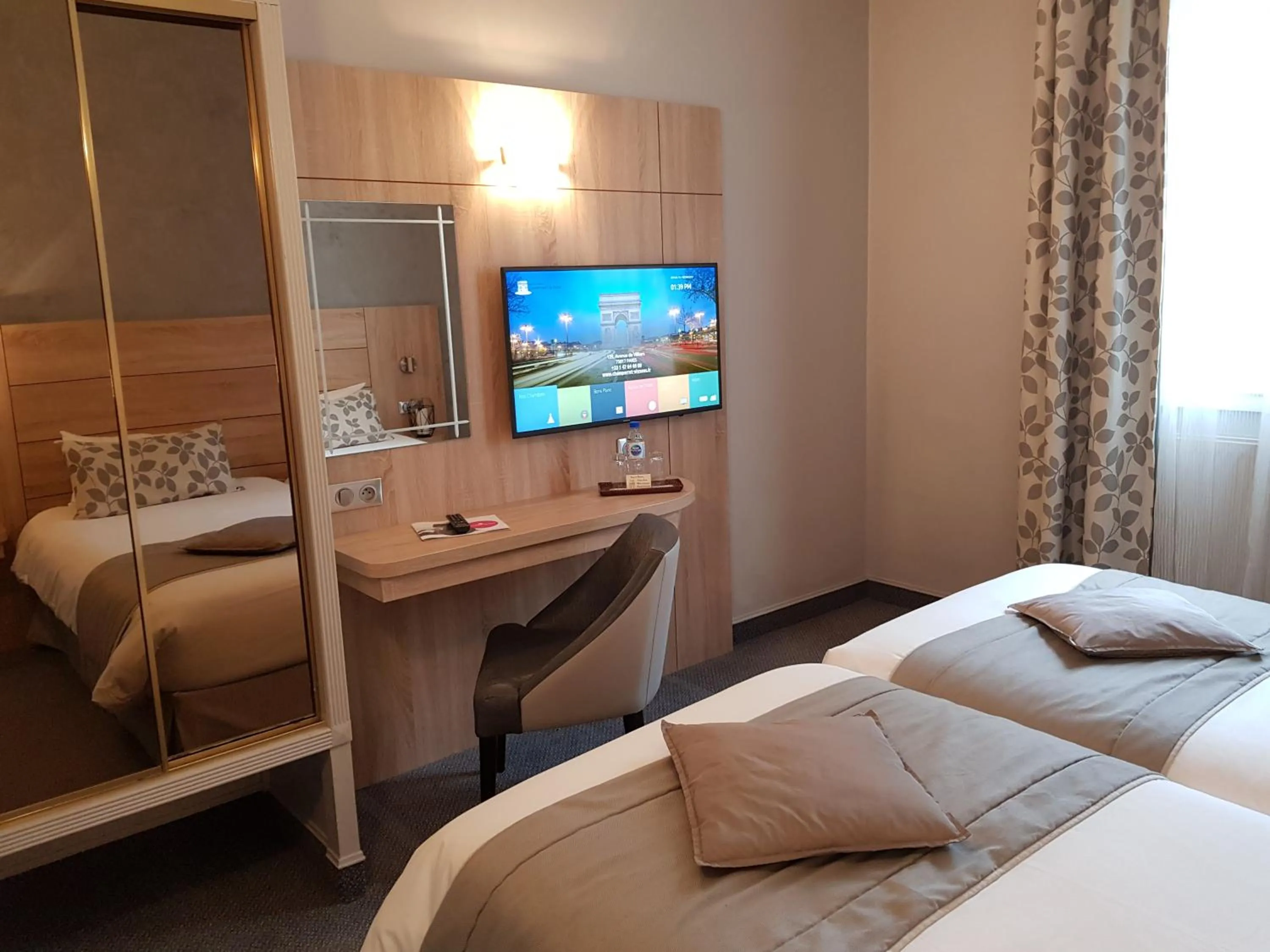 Bed in Hotel Champerret Elysees