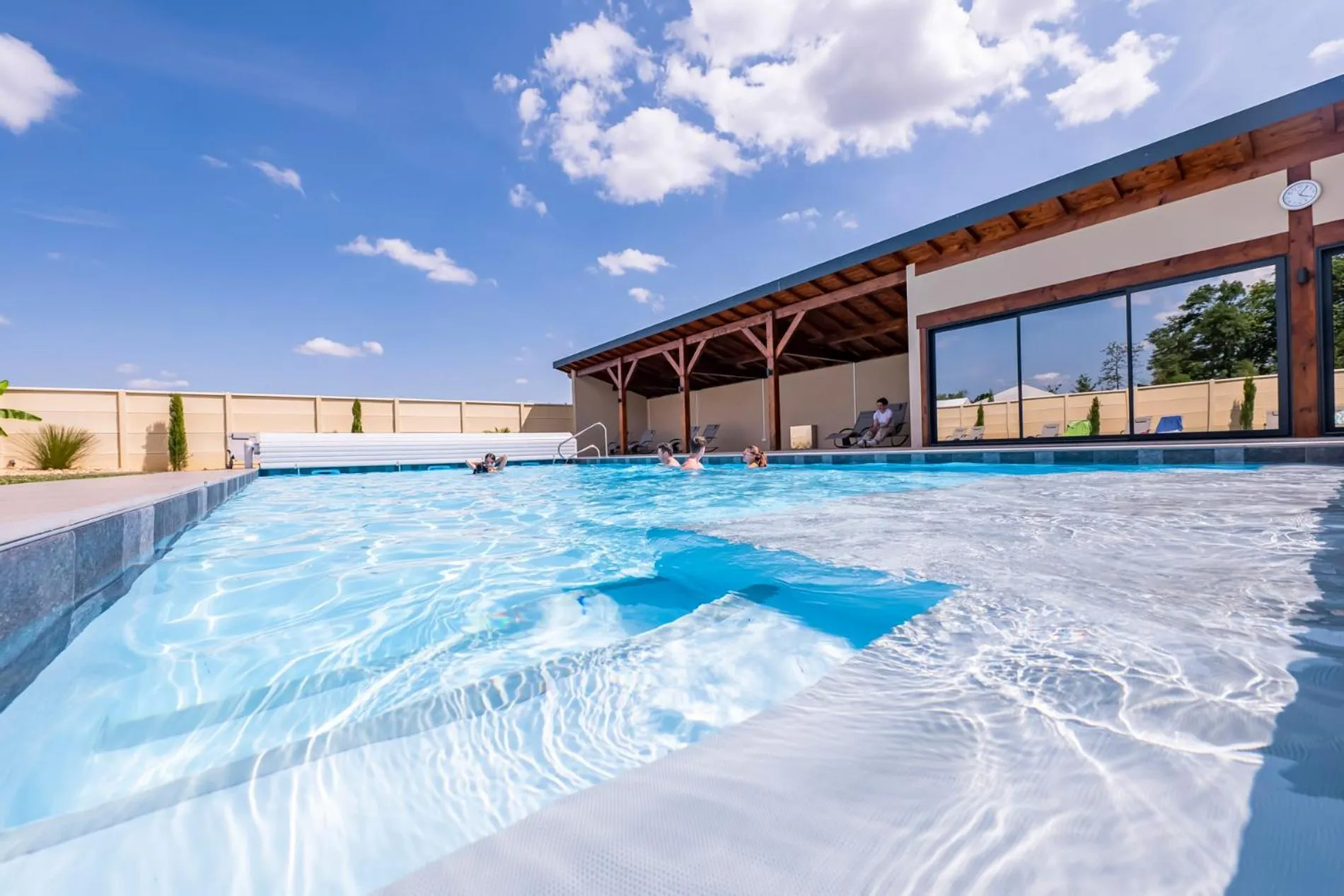 Swimming pool in Hôtel du Moulin de la Brevette