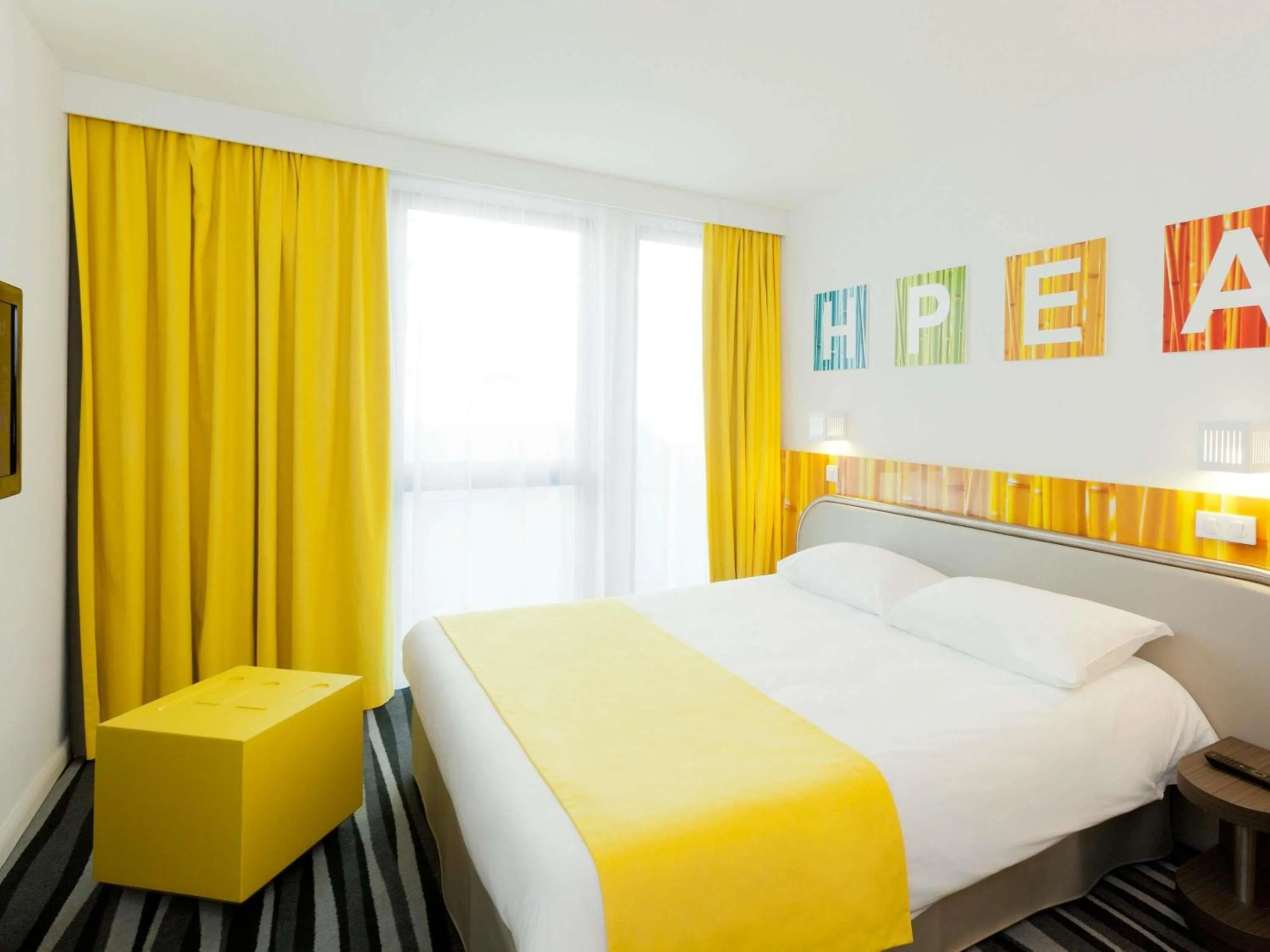 Bedroom, Bed in ibis Styles Paris Porte d'Orléans