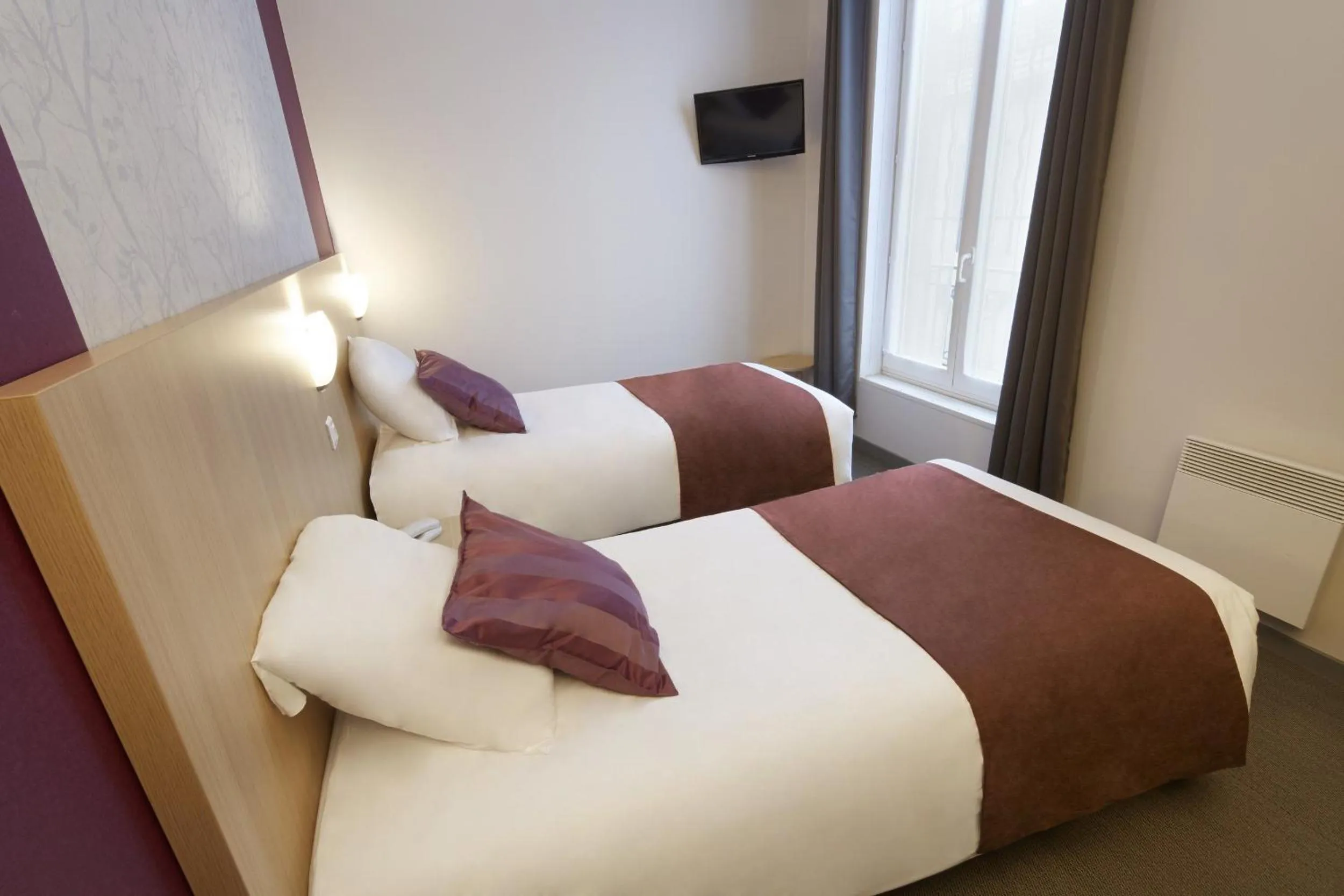 Photo of the whole room, Bed in Hotel Paris Villette
