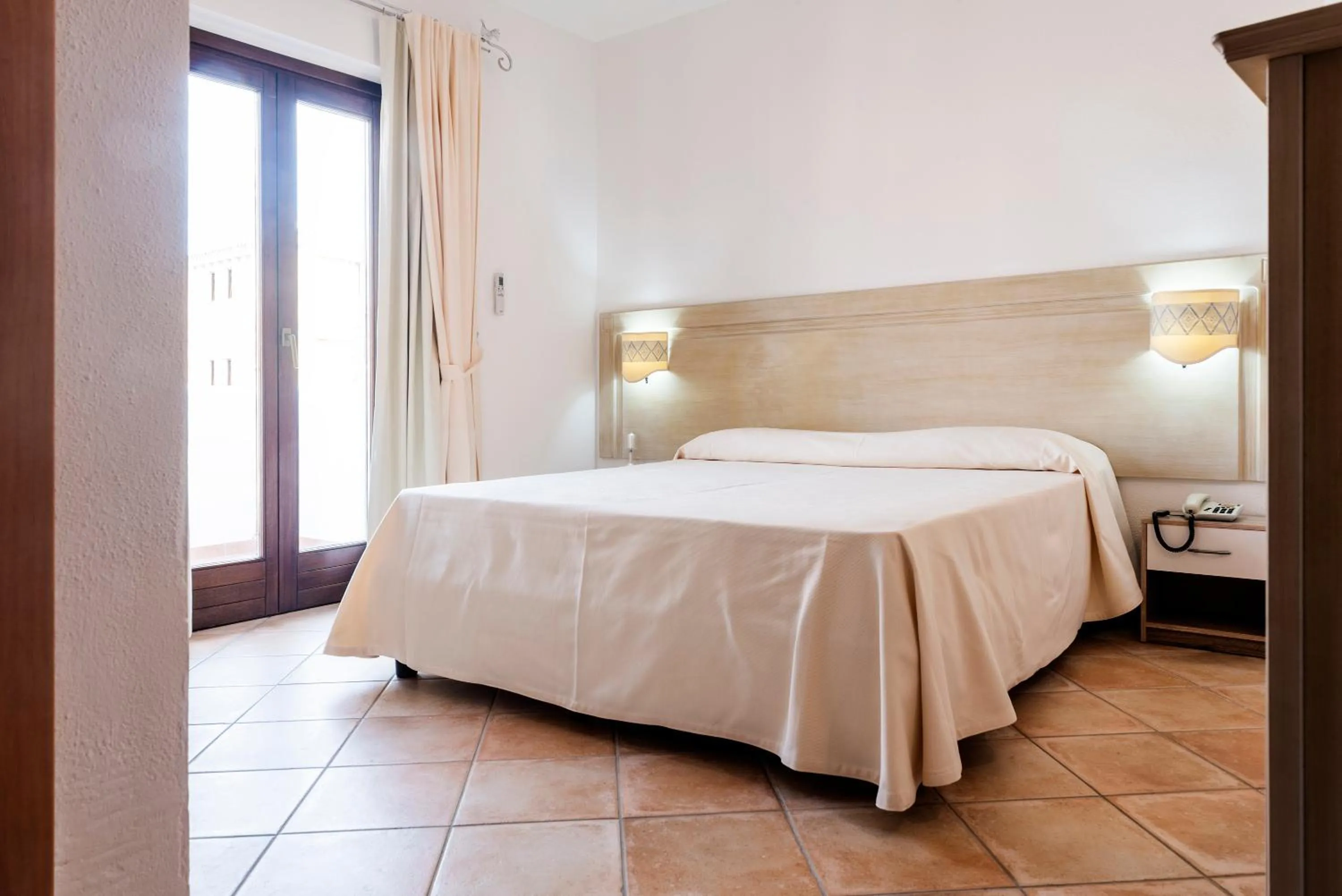 Photo of the whole room, Bed in Hotel il Faro di Molara