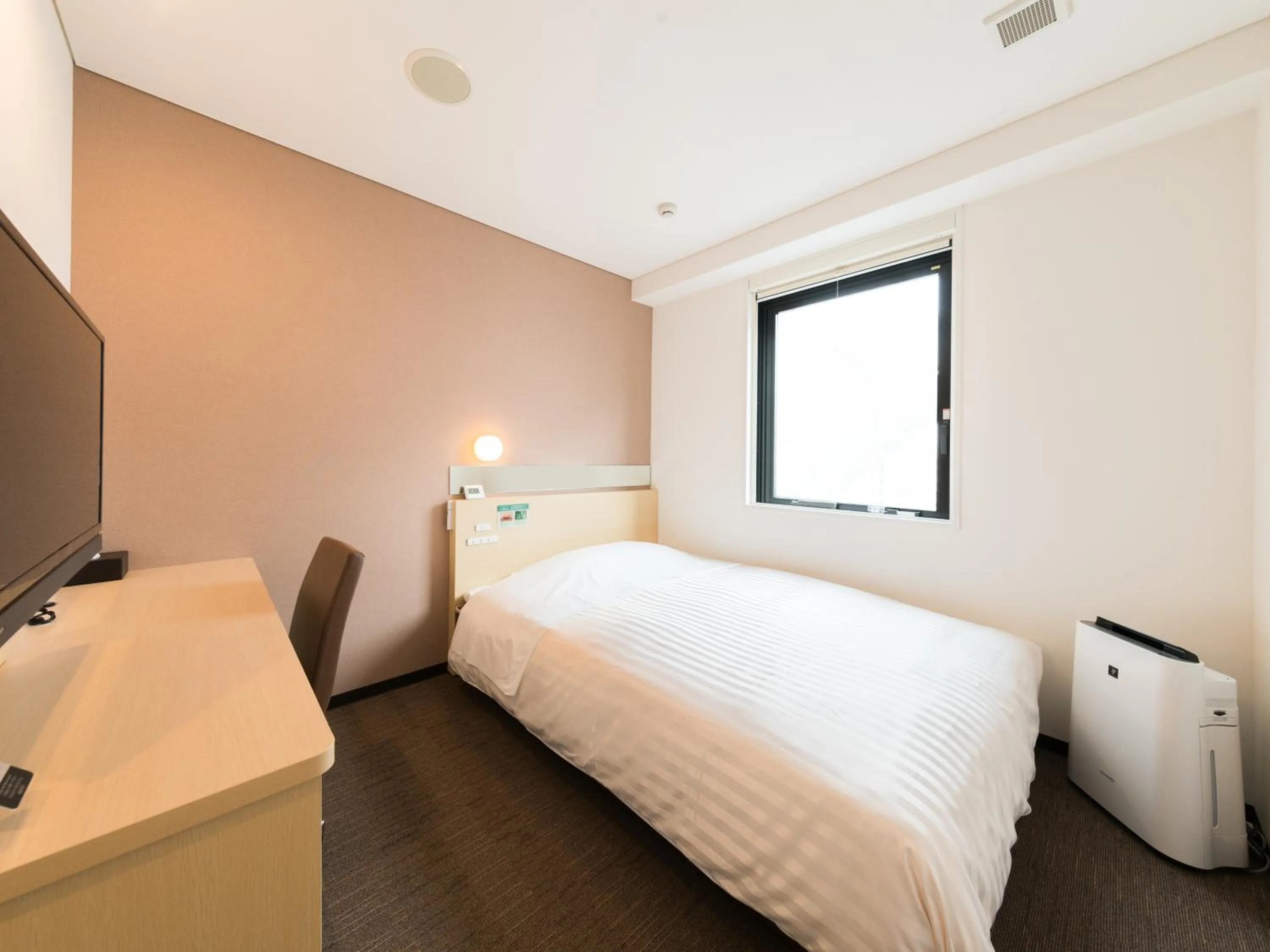 Bed in Super Hotel Tokyo Kinshicho Ekimae