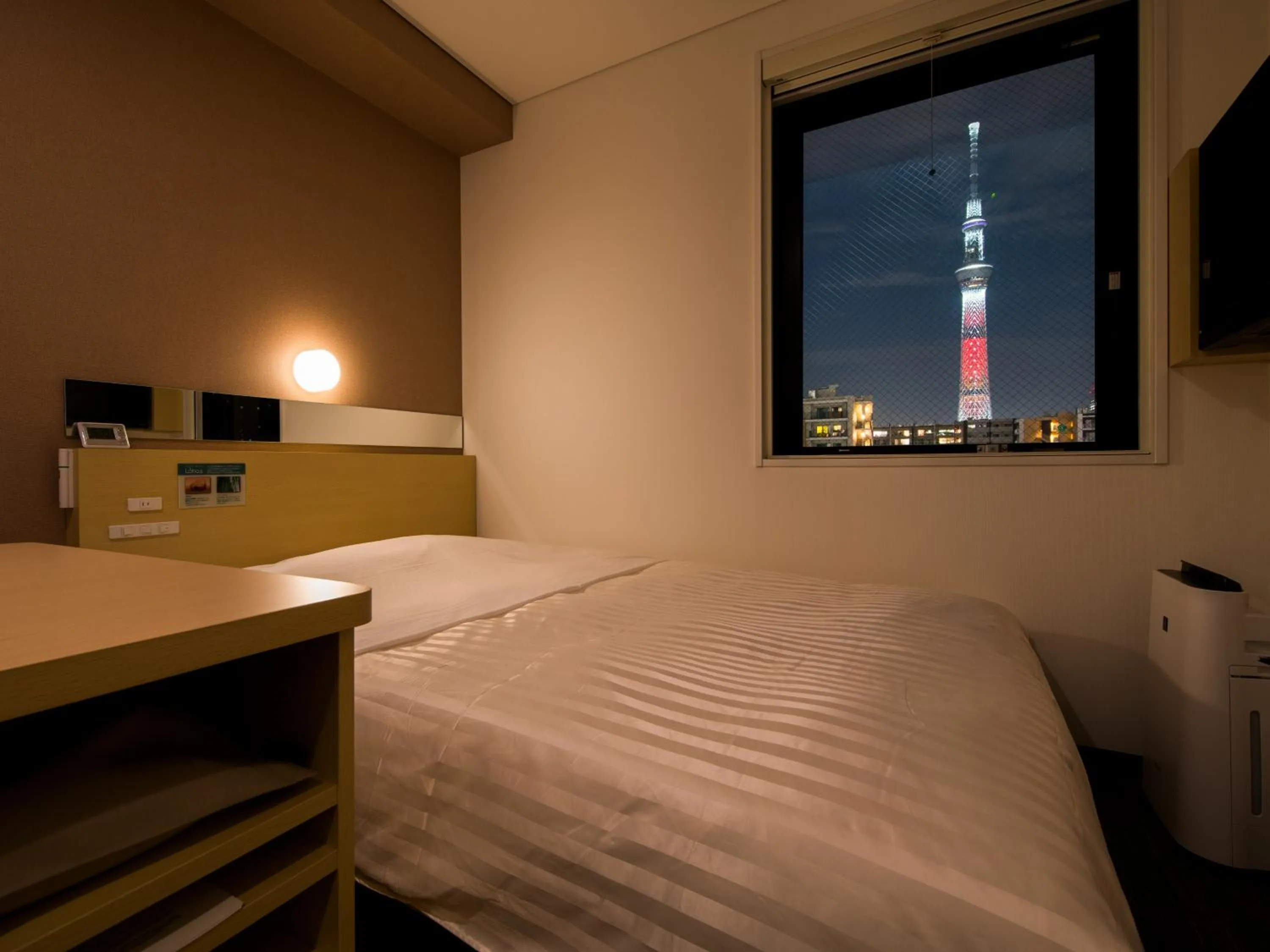 Landmark view, Bed in Super Hotel Tokyo Kinshicho Ekimae