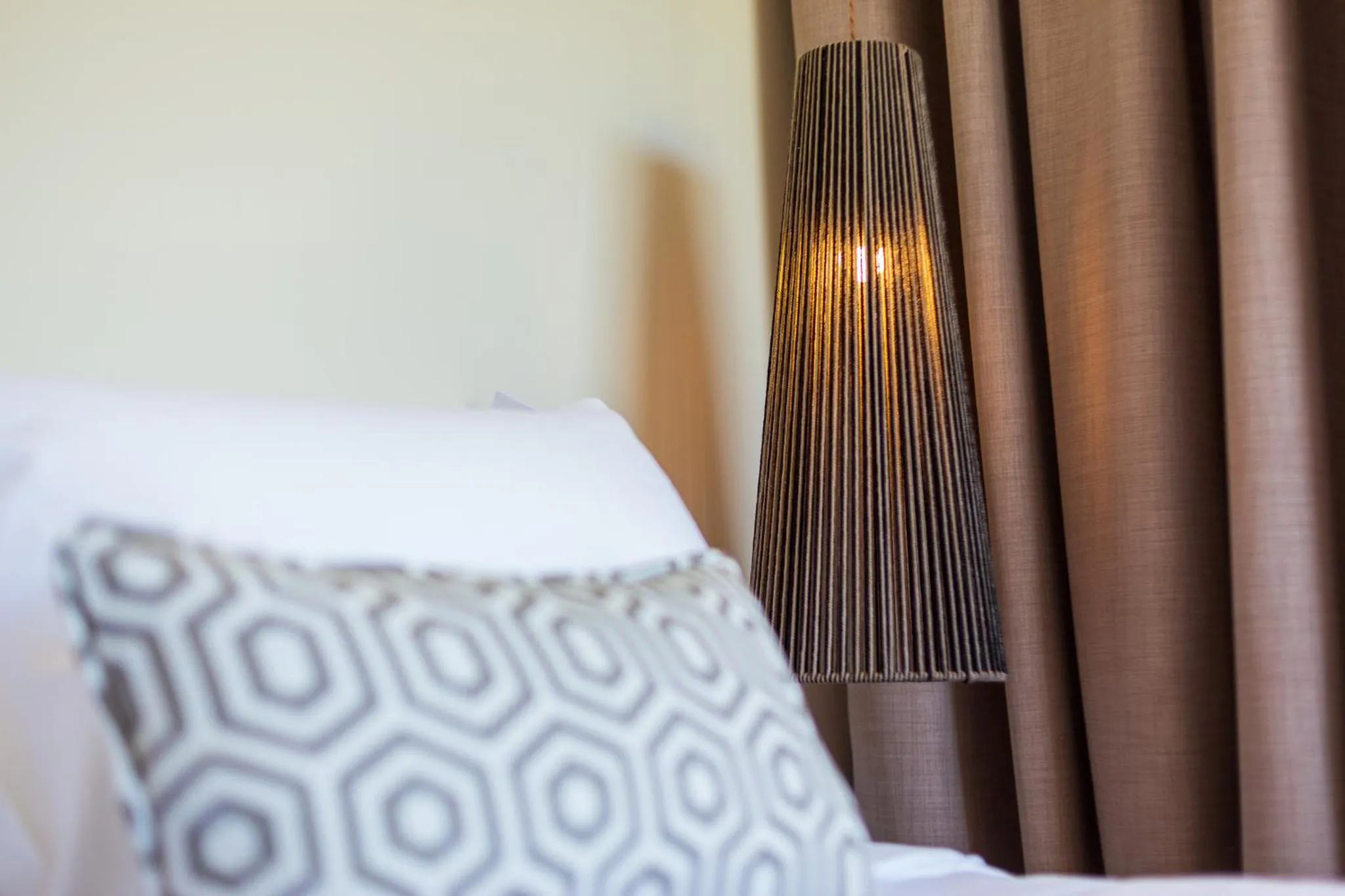 Bed in 180 South Seaside Hotel