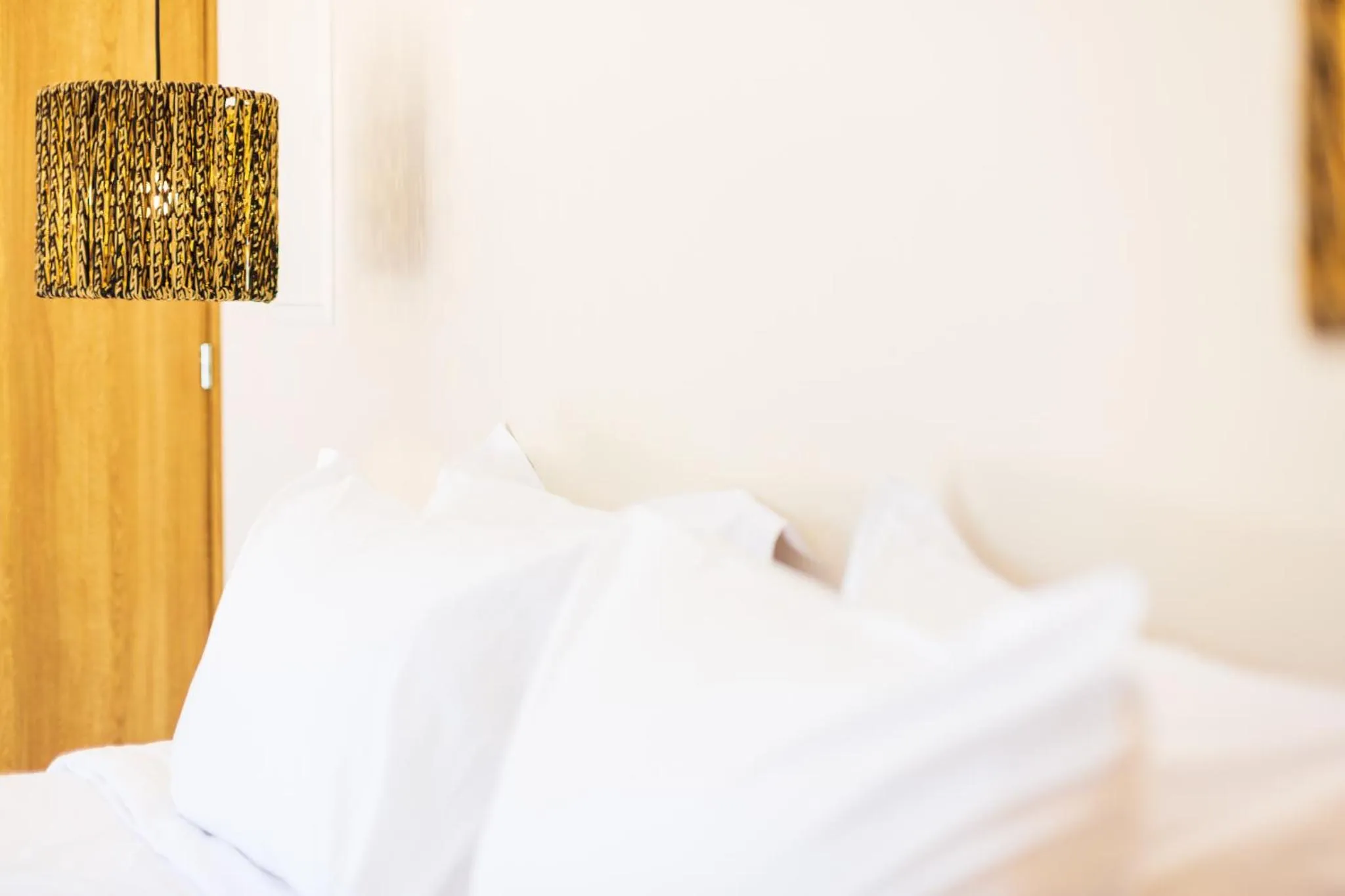 Bed in 180 South Seaside Hotel