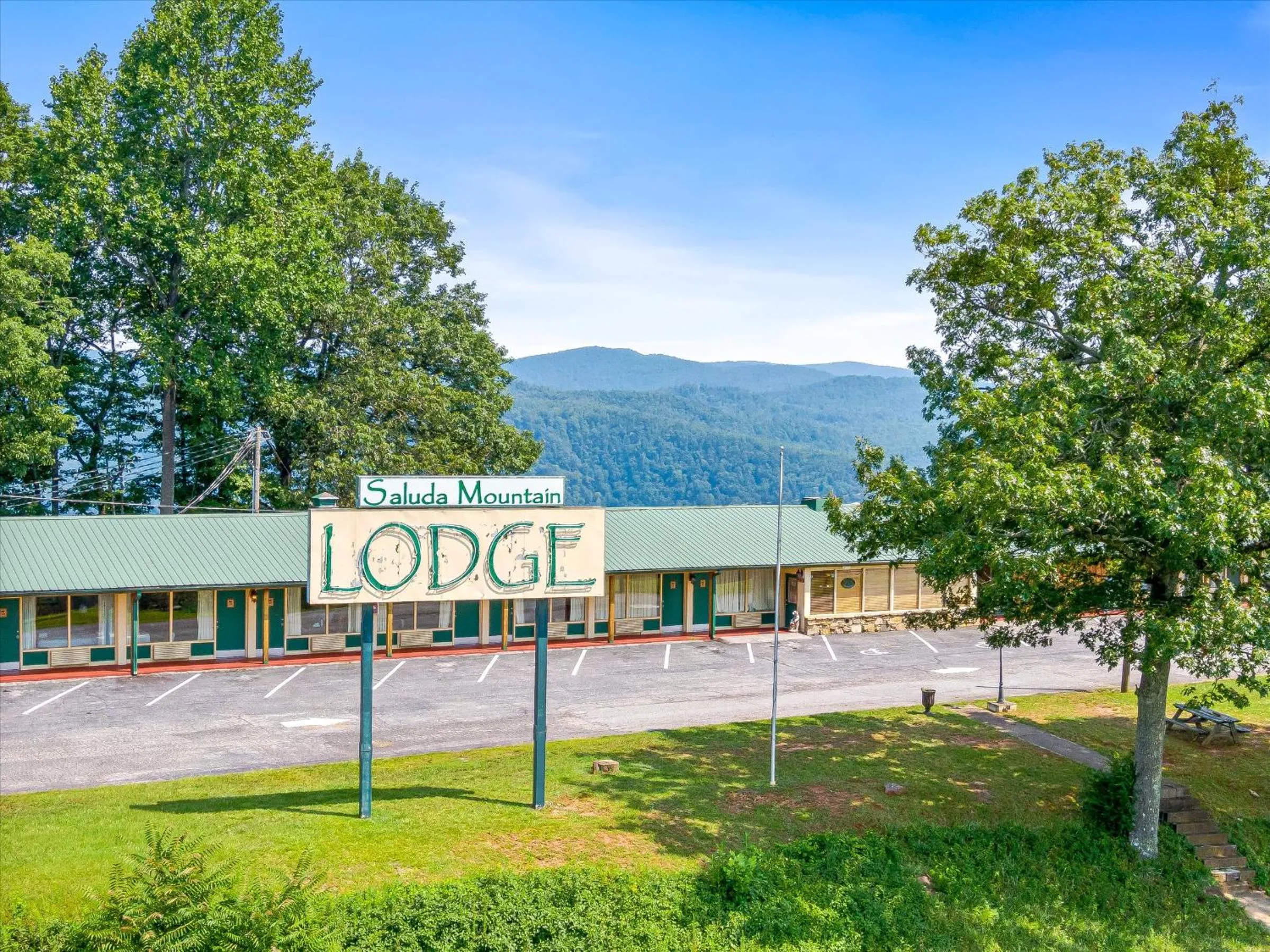Property logo or sign in Early Blue Motel