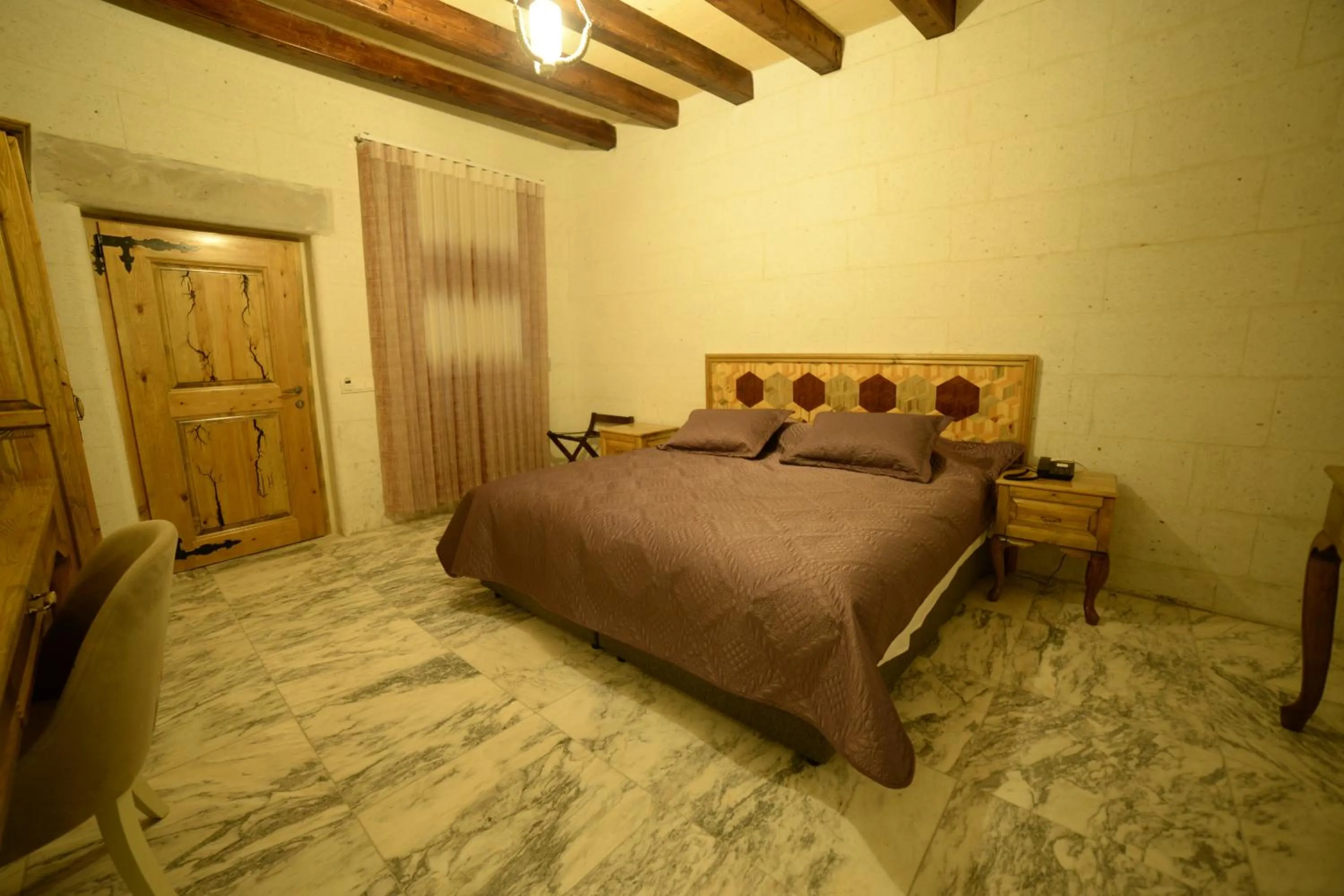 Bed in Crassus Cave Hotel