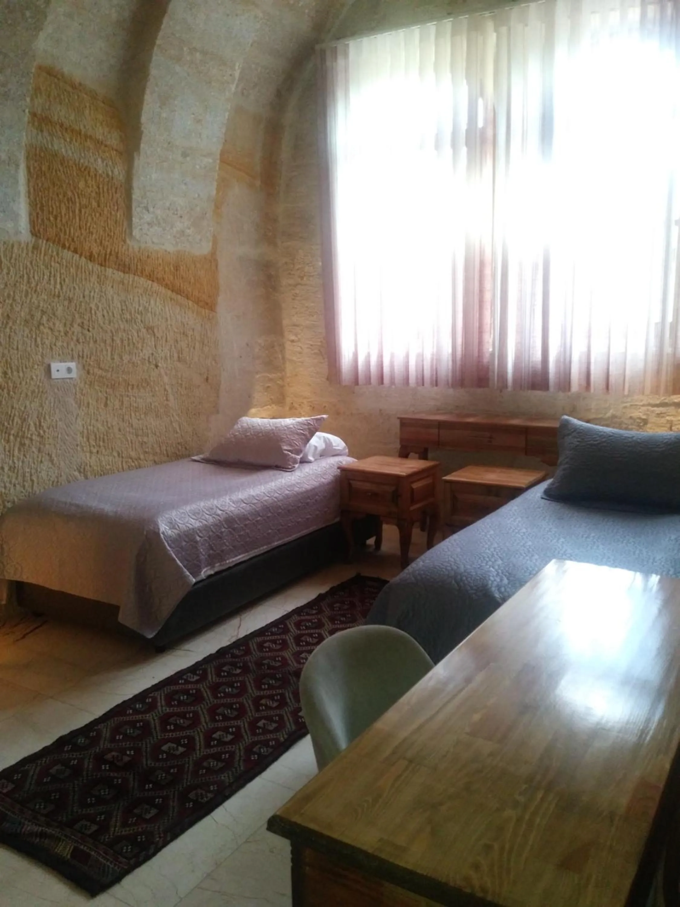 Bed in Crassus Cave Hotel
