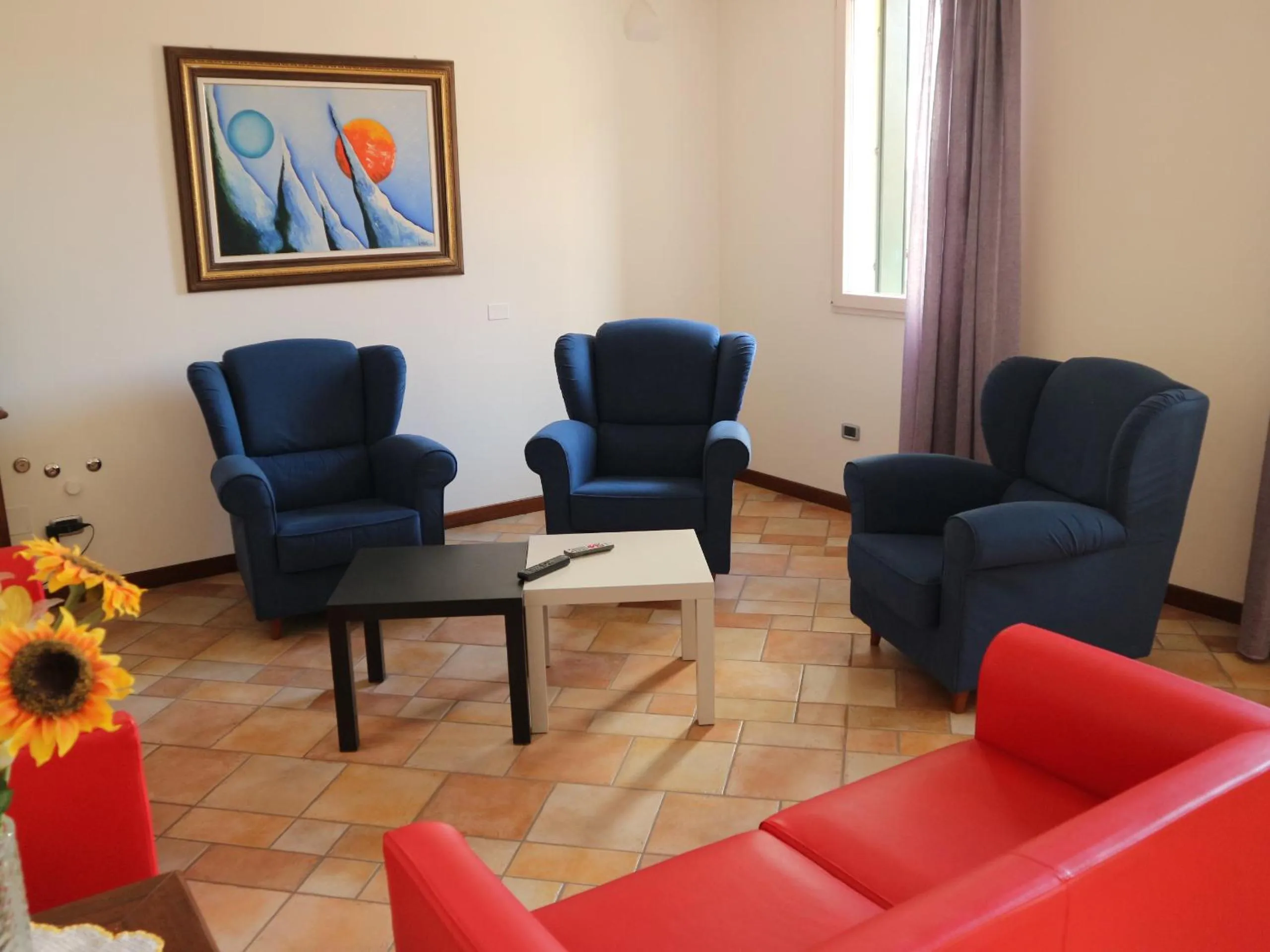 Communal lounge/ TV room in B&B Primula House