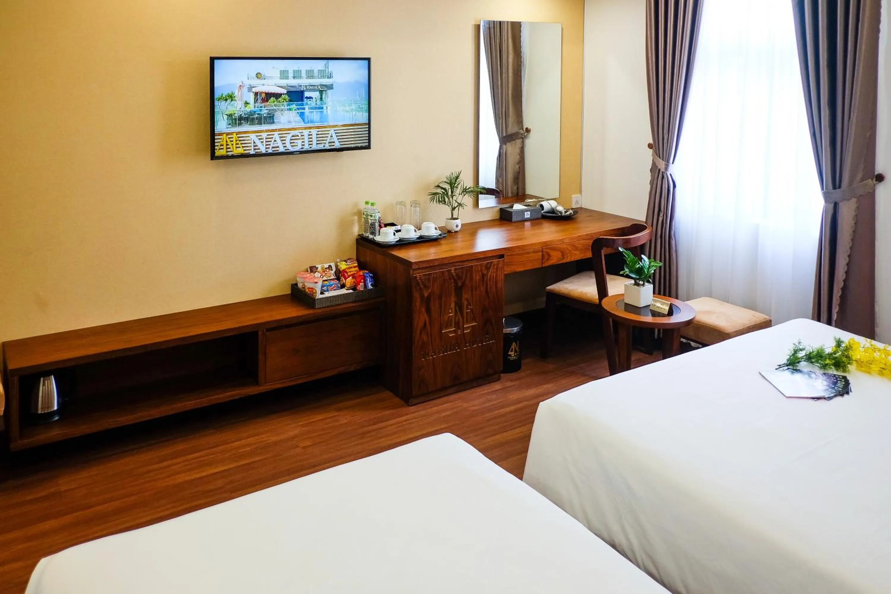 TV and multimedia, Bed in Nagila Boutique Hotel