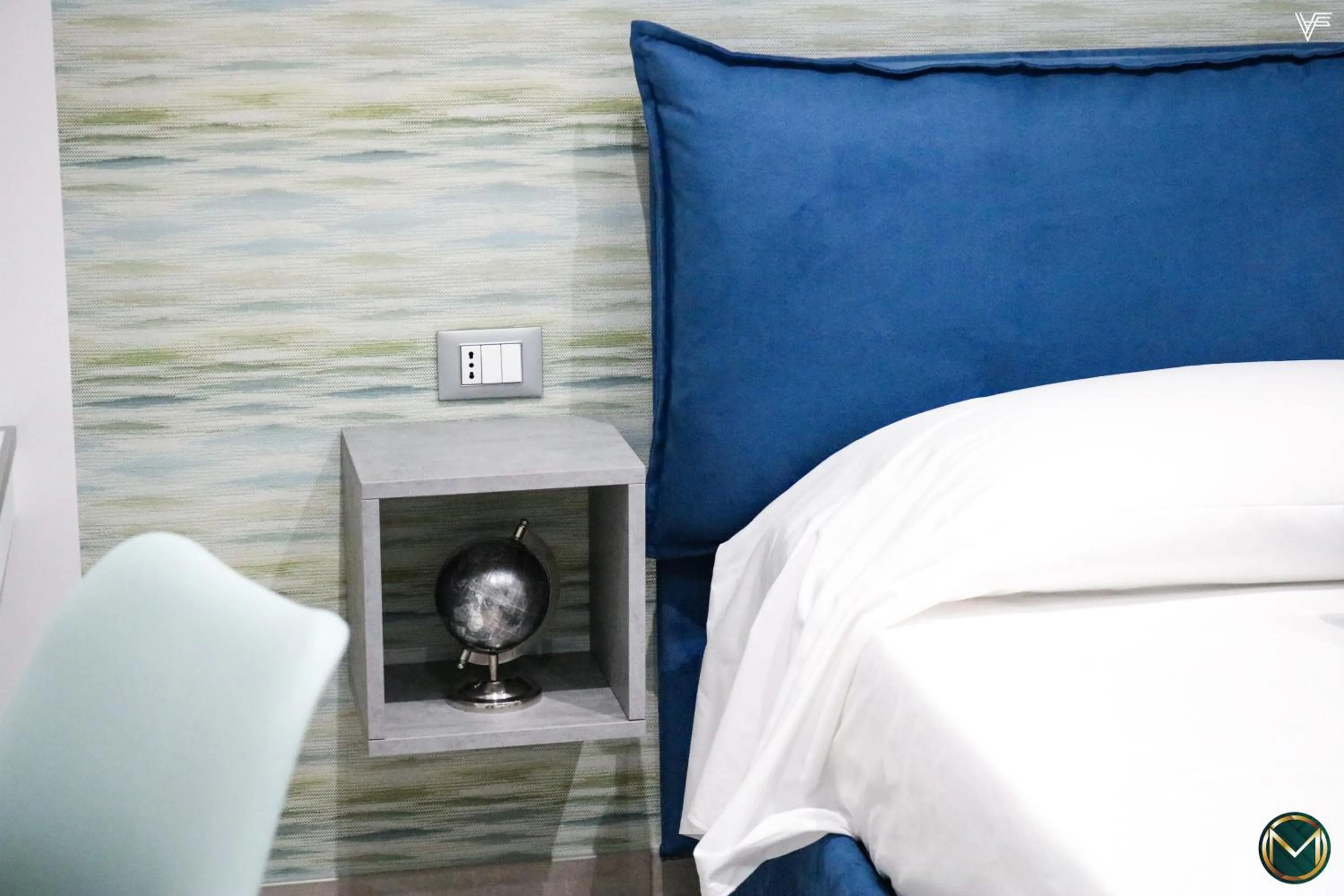 Bed in MARGHERITA BOUTIQUE ROOMS