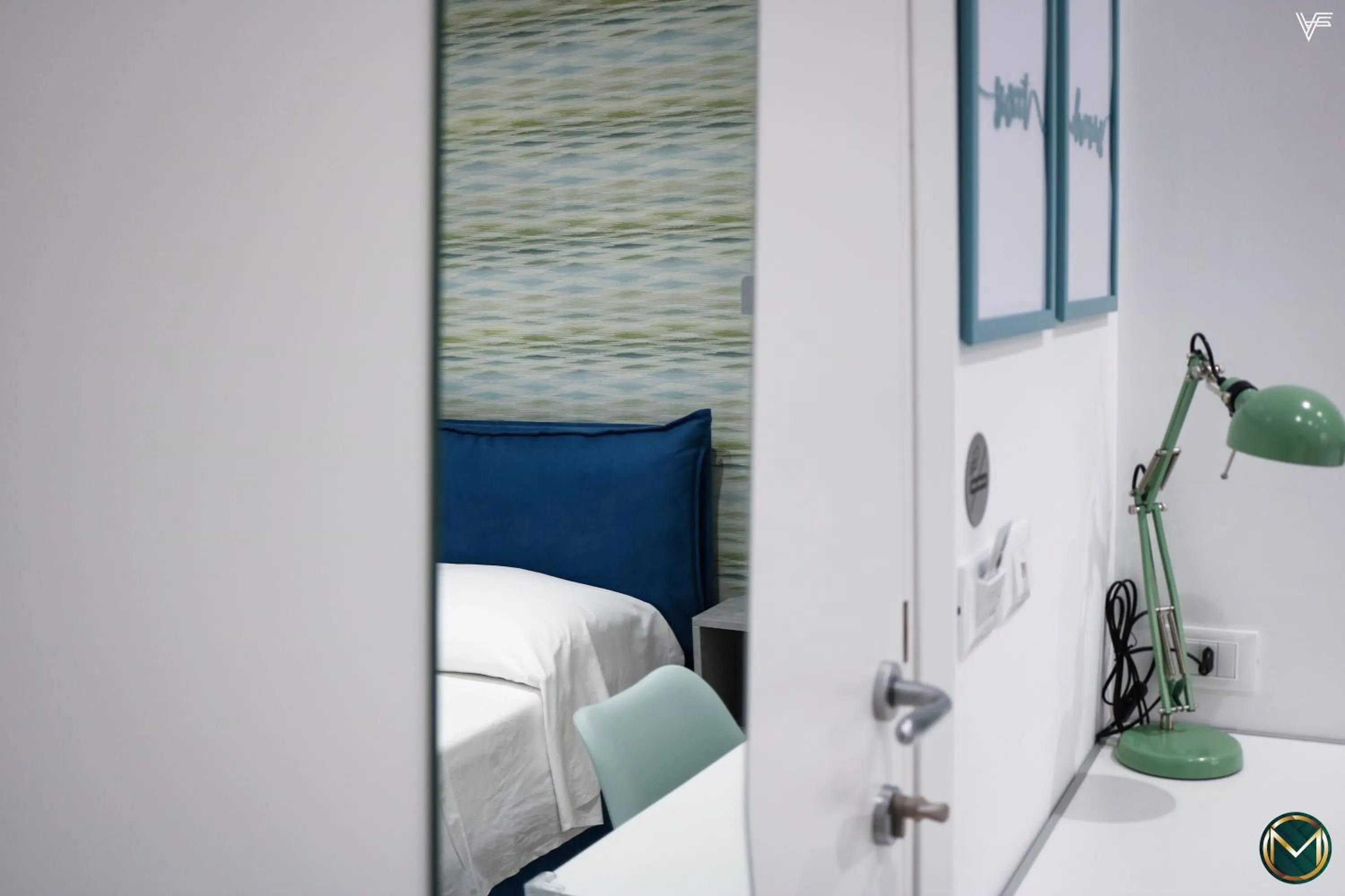 Bed in MARGHERITA BOUTIQUE ROOMS