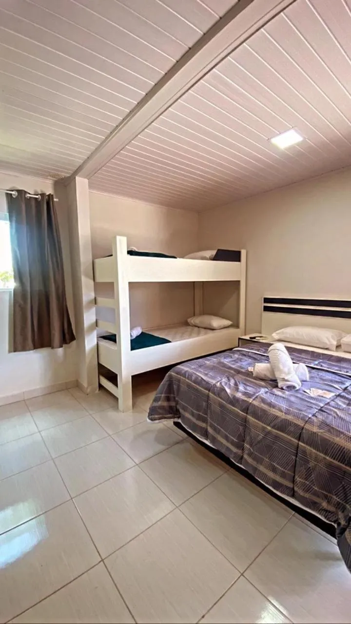 Bed in Pousada Coração do Parque