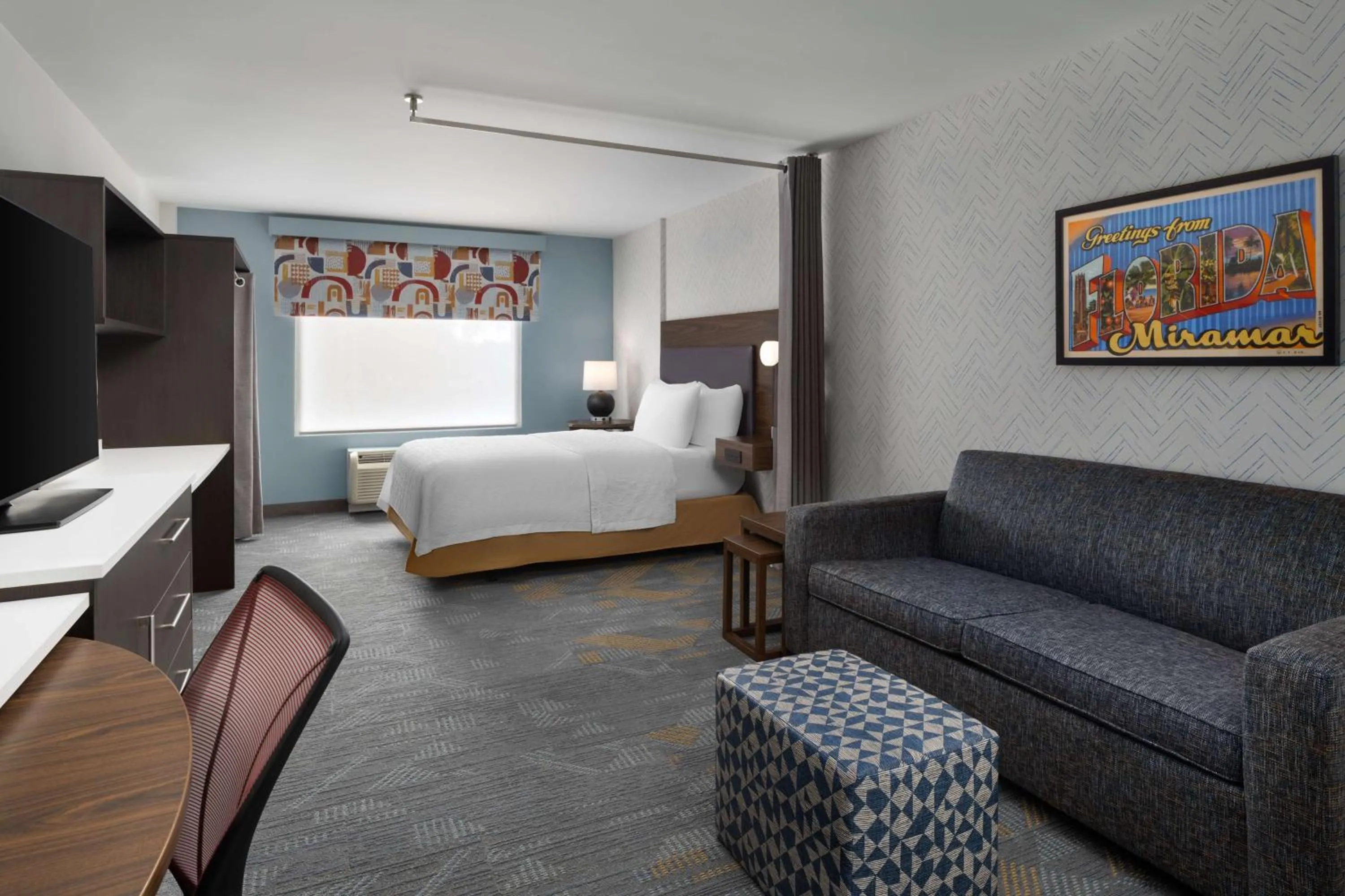 Living room, Bed in Home2 Suites by Hilton Miramar Ft. Lauderdale