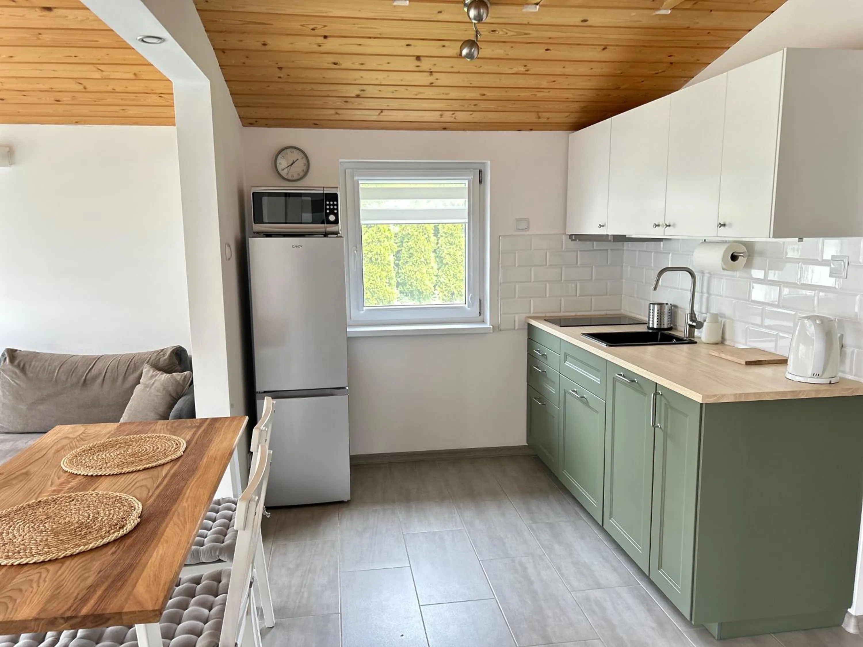 Kitchen or kitchenette in Domki u Grażyny Mikołajki