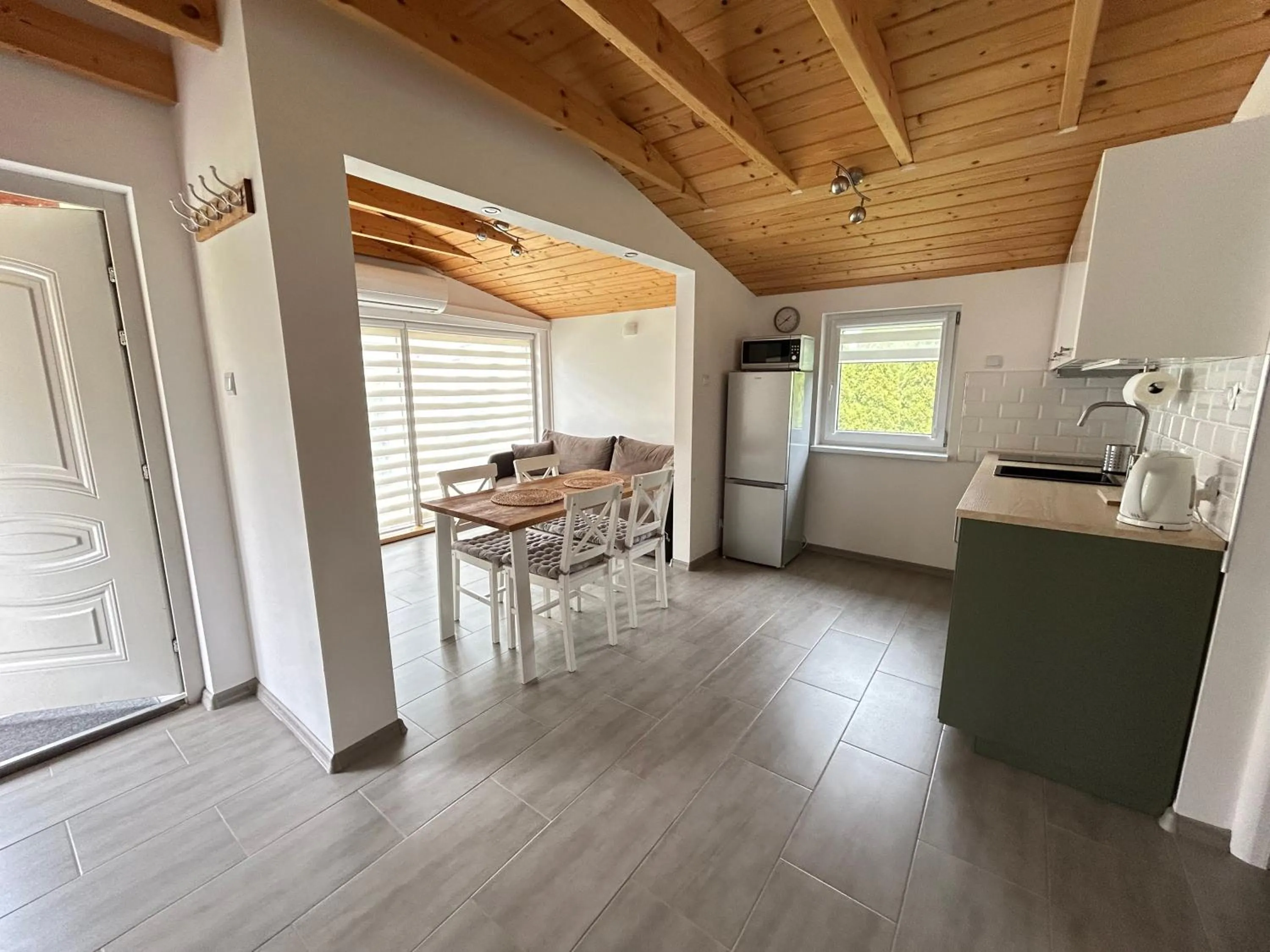 Kitchen or kitchenette in Domki u Grażyny Mikołajki