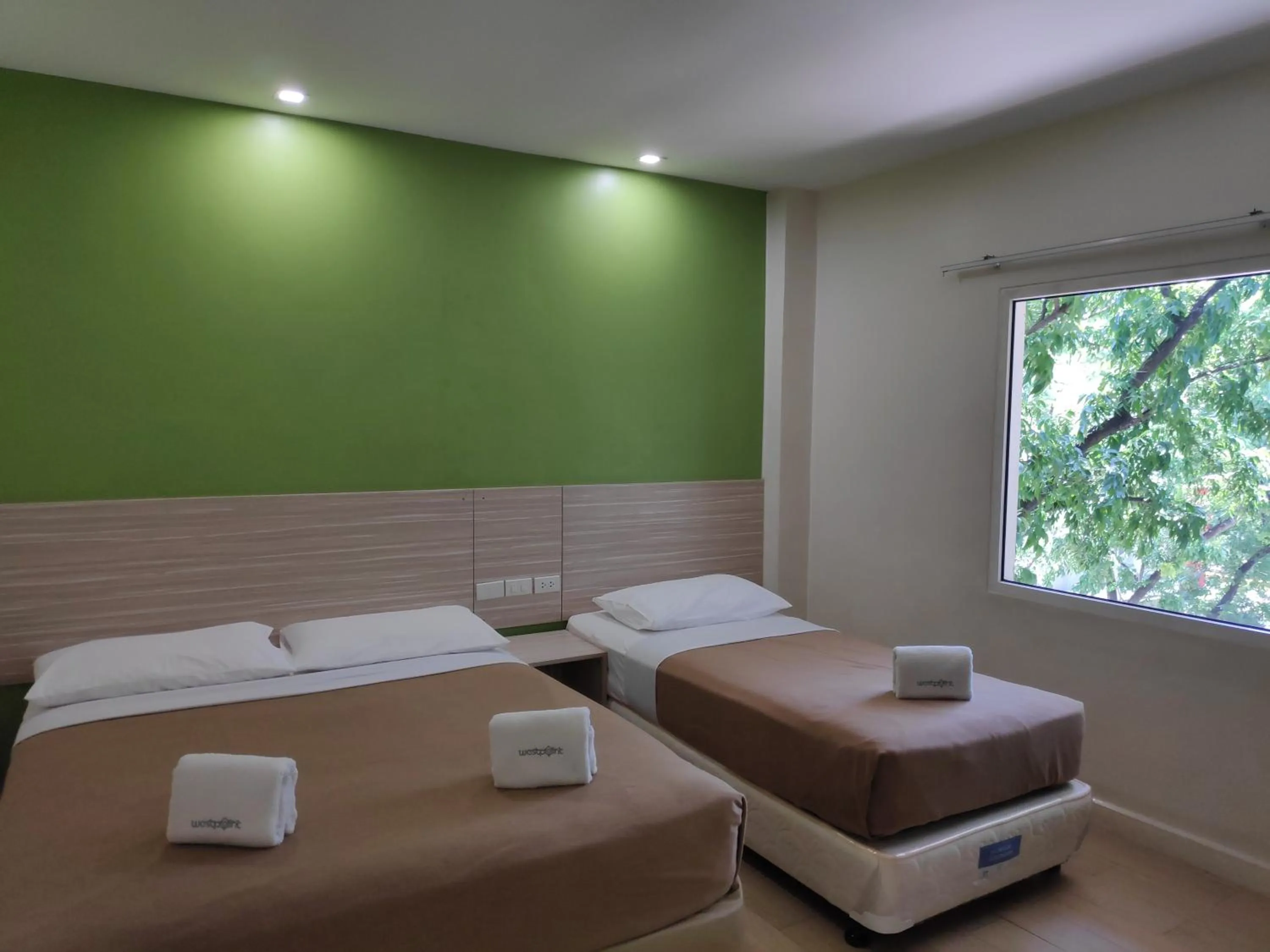 Bed in Westpoint Hotel