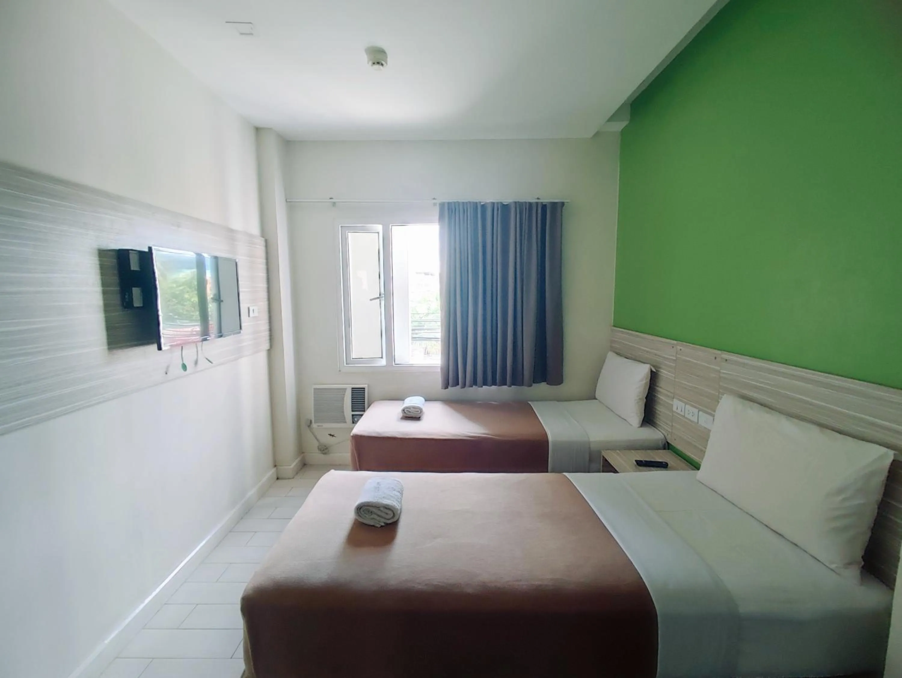 Bed in Westpoint Hotel