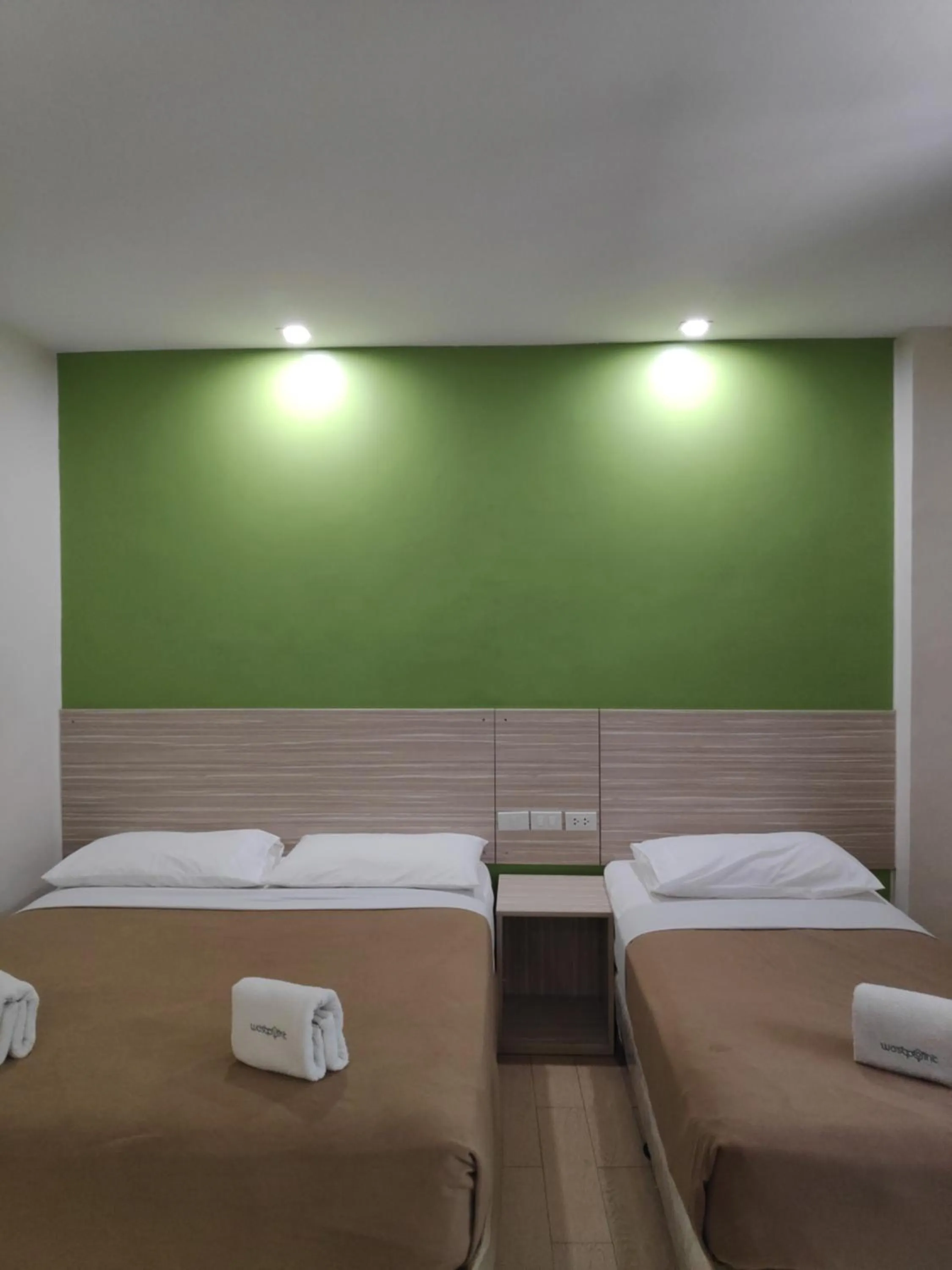 Bed in Westpoint Hotel