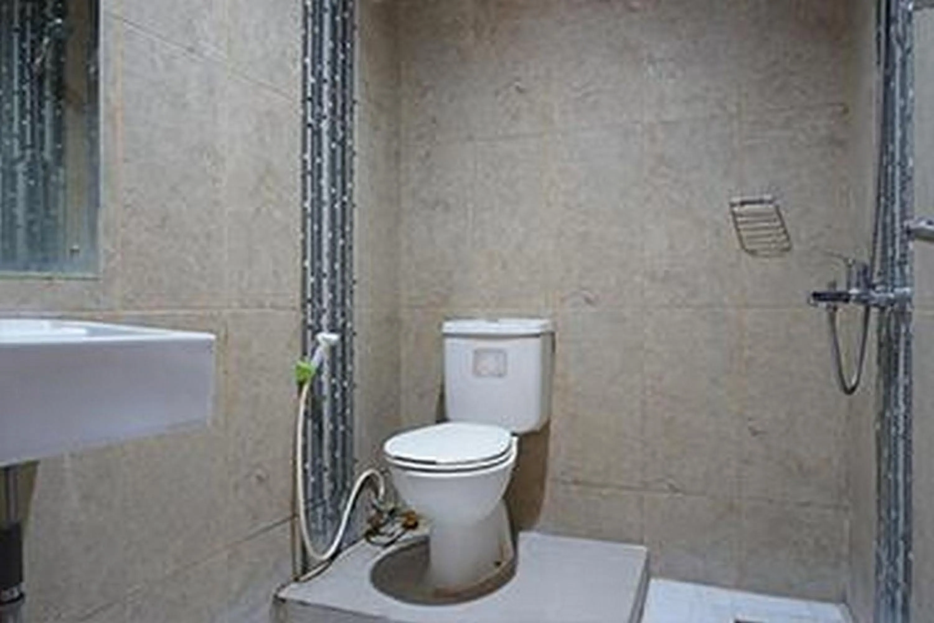 Bathroom in RedDoorz near Kemang Square