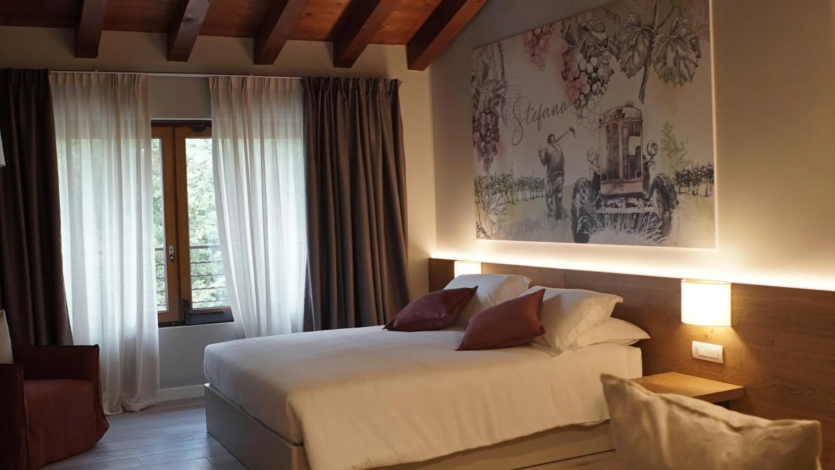 Bed in AGRITURISMO ACINATICO WINE RELAIS