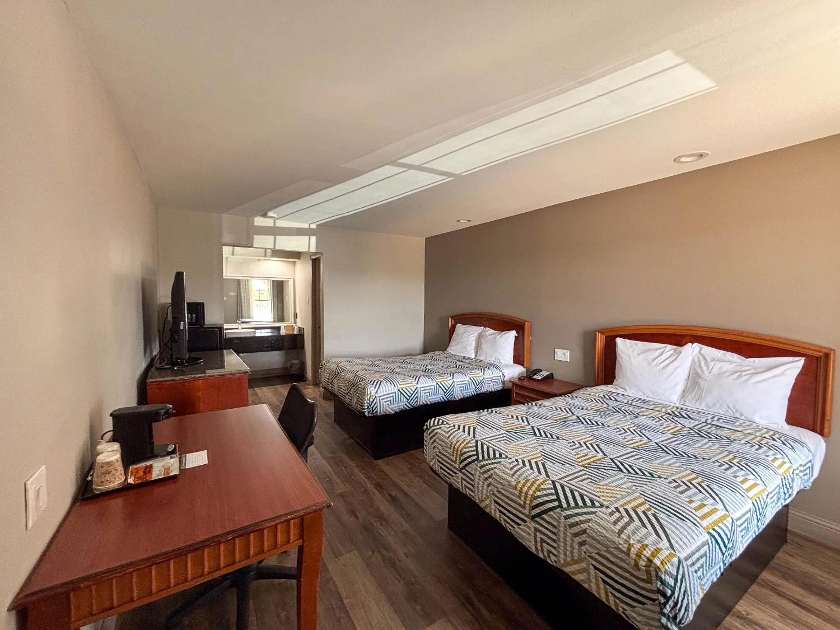 Bed in Studio 6 Suites Mesquite, TX – Gross Rd.