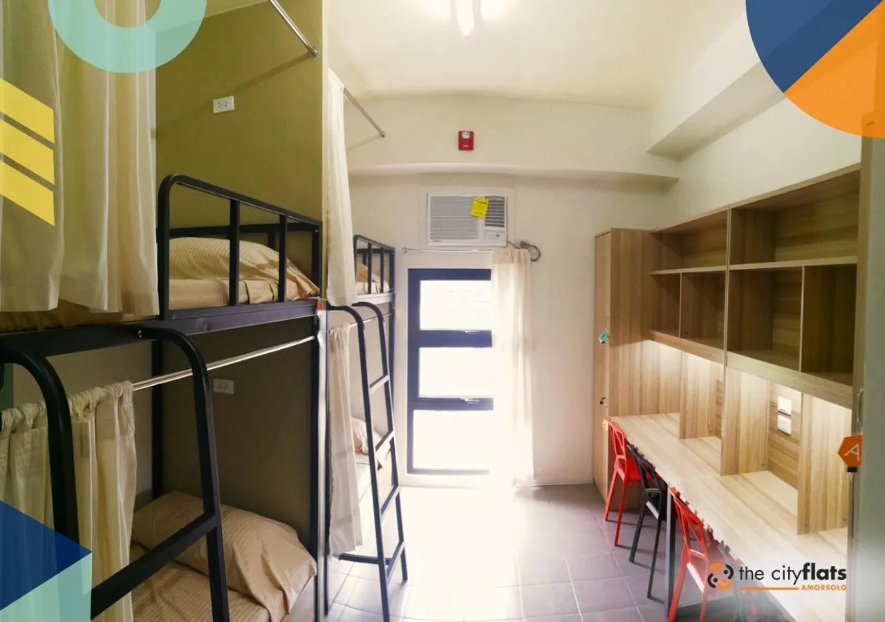 Photo of the whole room, Bed in The City Flats Amorsolo