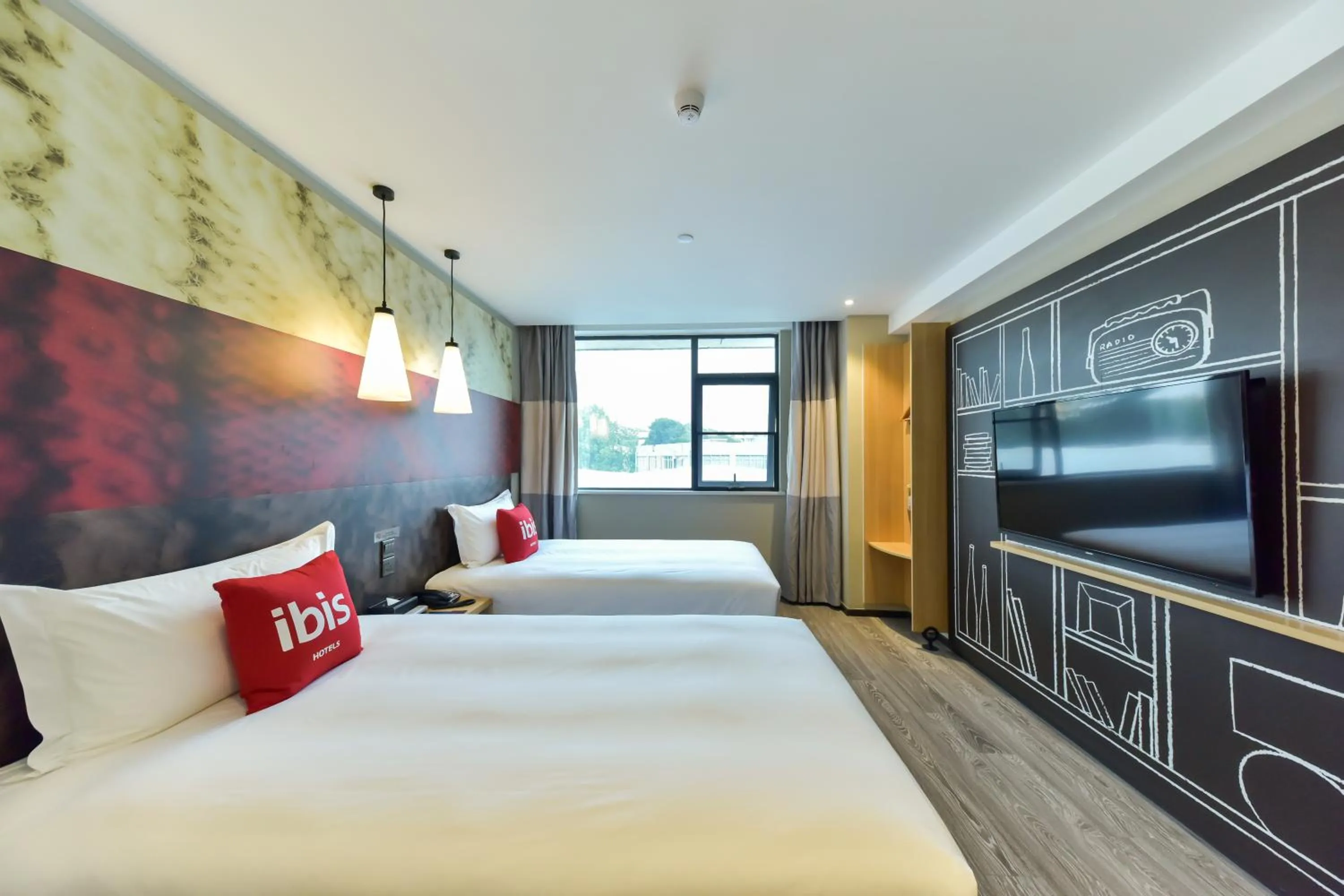 Bed in Ibis Guangzhou Pazhou International Exhibition Center Hotel