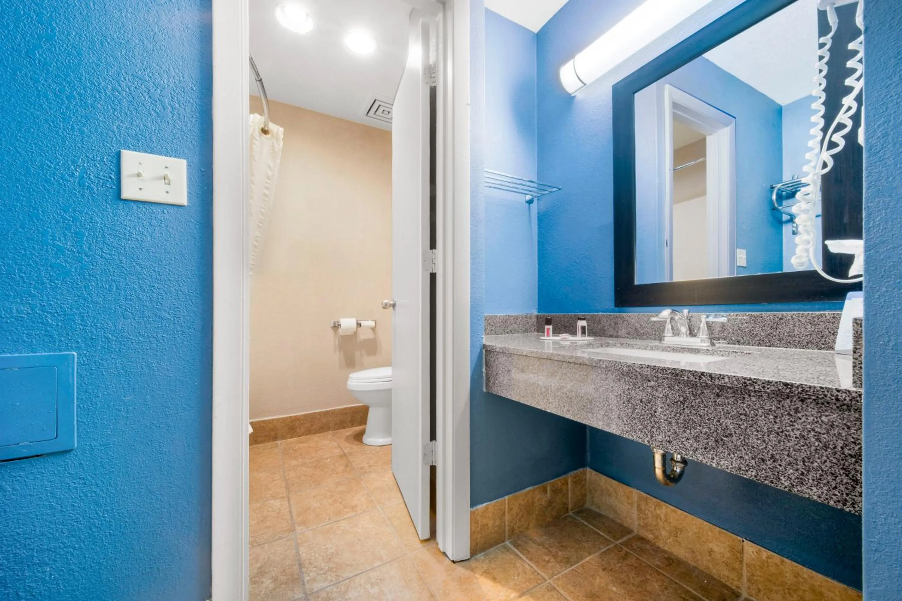Bathroom in Baymont by Wyndham Muncie Near Ball State University